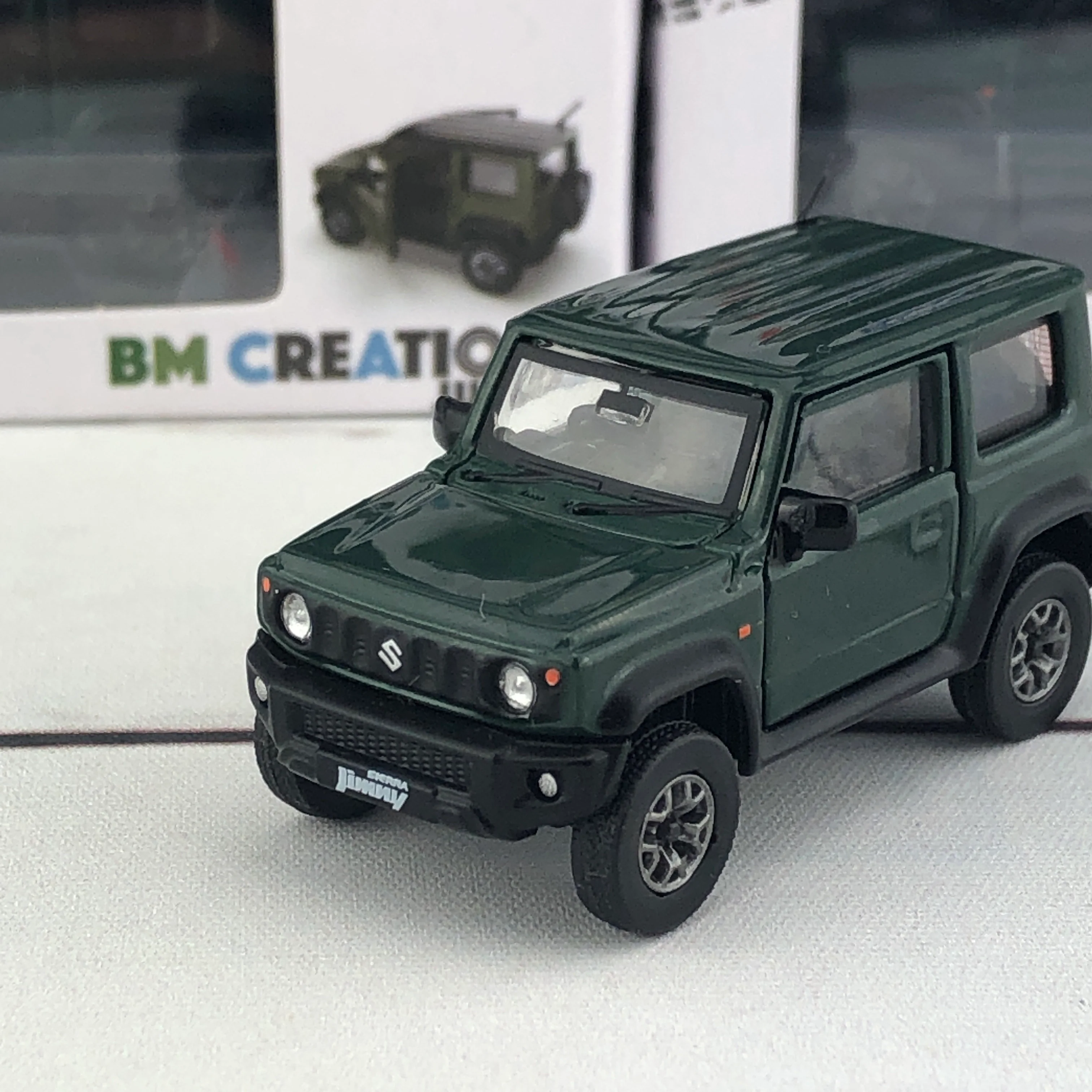 BM CREATIONS 1/64 Suzuki Jimny Sierra (JB74) RHD - Jungle Green (ZZC) 64B0005 - Image 3