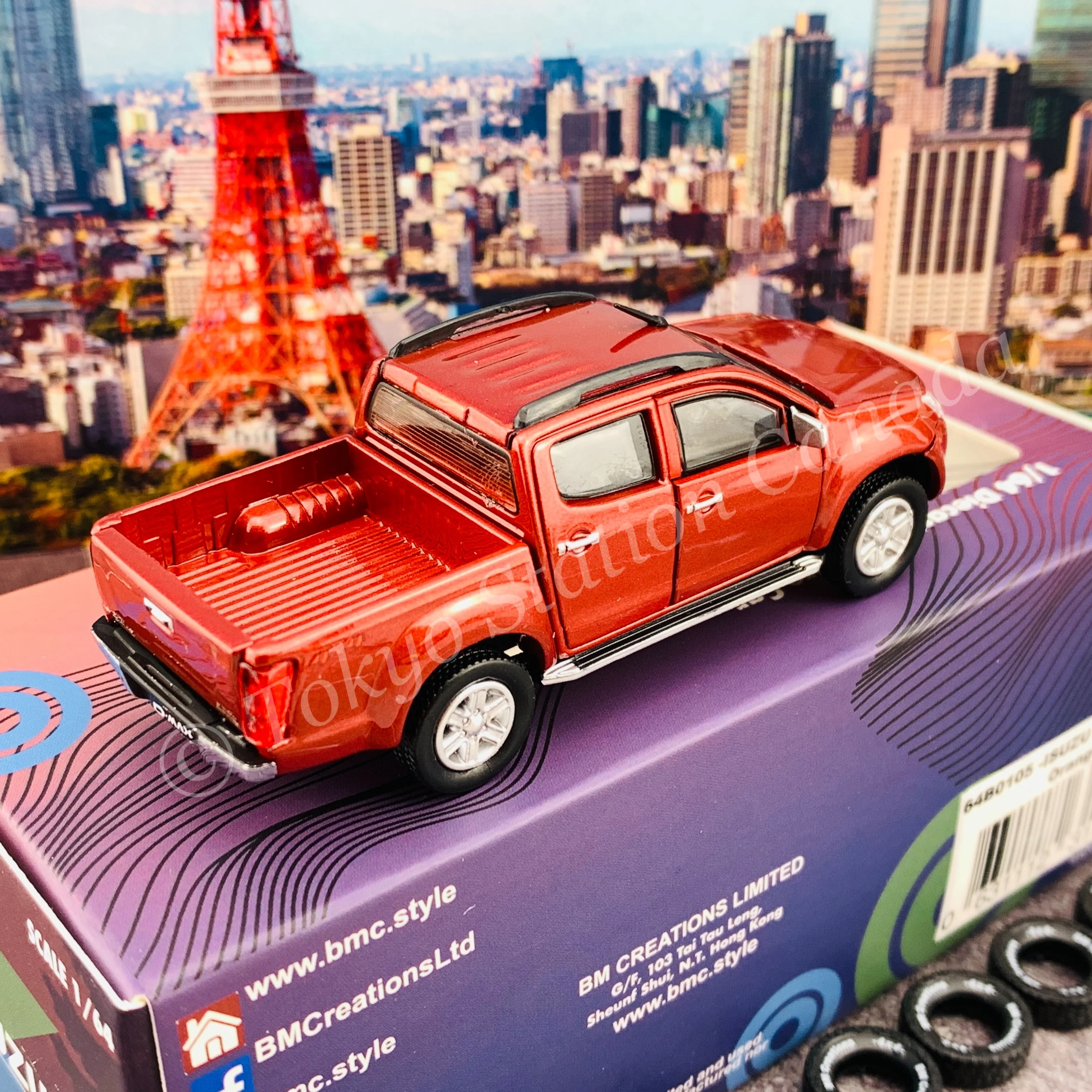 BM CREATIONS JUNIOR 1/64 ISUZU D-MAX 2016 Orange Red LHD with Extra Tires 64B0105 - Image 3