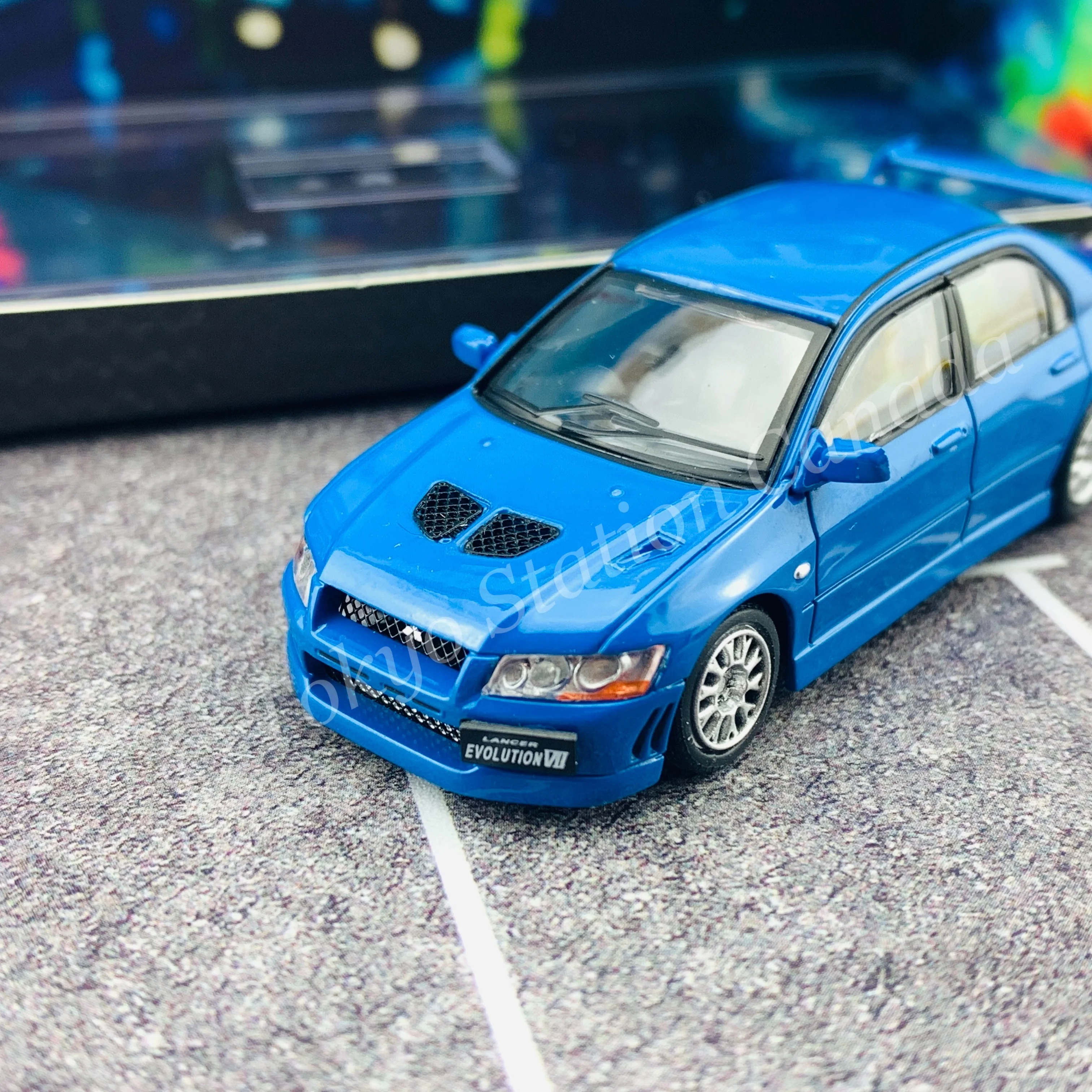 BM CREATIONS JUNIOR 1/64 Mitsubishi Lancer Evolution VII BLUE RHD with Extra Wheel Set and Lowering Parts 64B0088 - Image 3