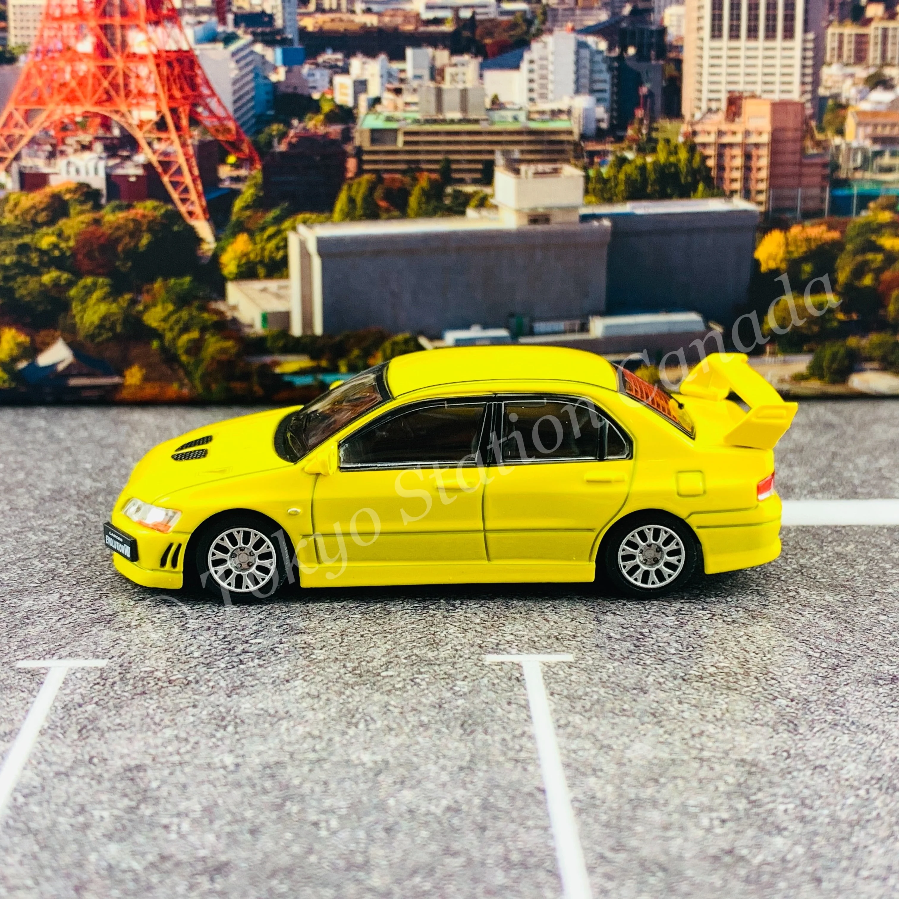 BM CREATIONS JUNIOR 1/64 Mitsubishi Lancer Evolution VII YELLOW LHD with Extra Wheel Set and Lowering Parts 64B0085 - Image 3