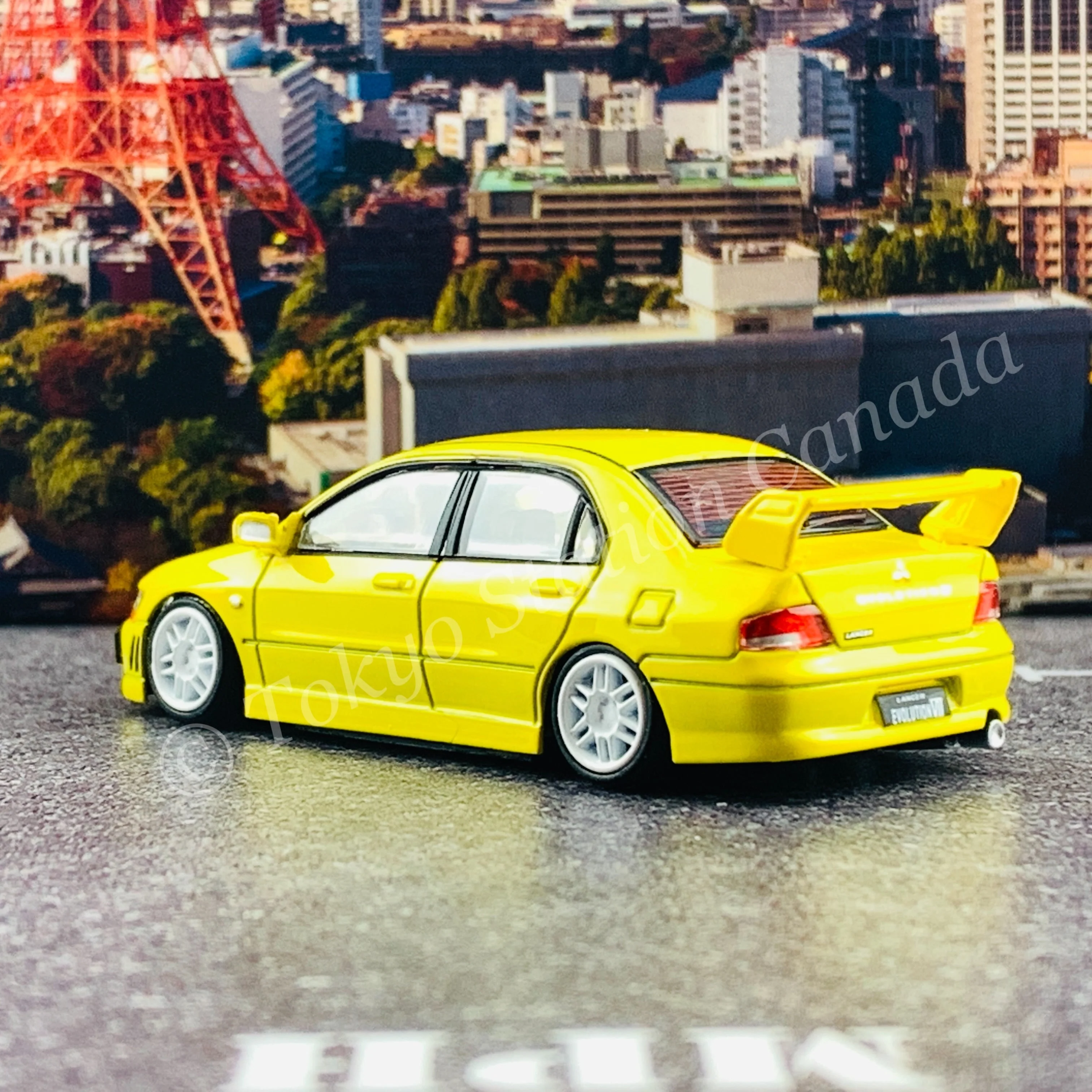 BM CREATIONS JUNIOR 1/64 Mitsubishi Lancer Evolution VII YELLOW LHD with Extra Wheel Set and Lowering Parts 64B0085 - Image 5