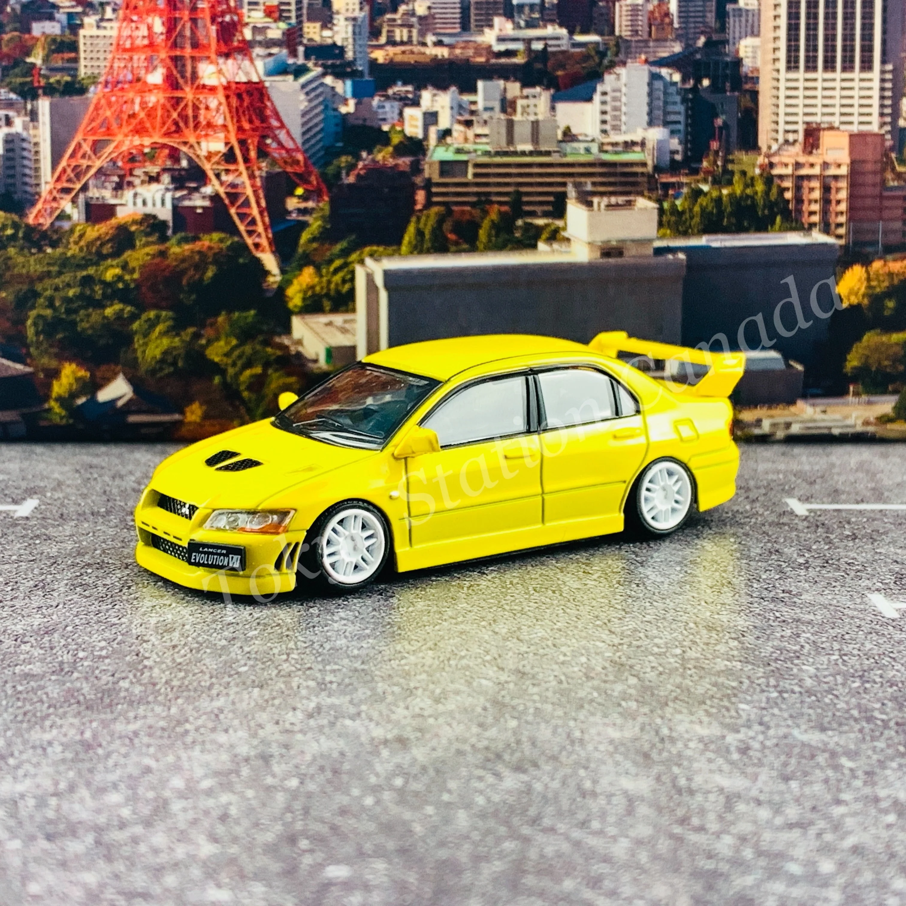 BM CREATIONS JUNIOR 1/64 Mitsubishi Lancer Evolution VII YELLOW LHD with Extra Wheel Set and Lowering Parts 64B0085 - Image 7