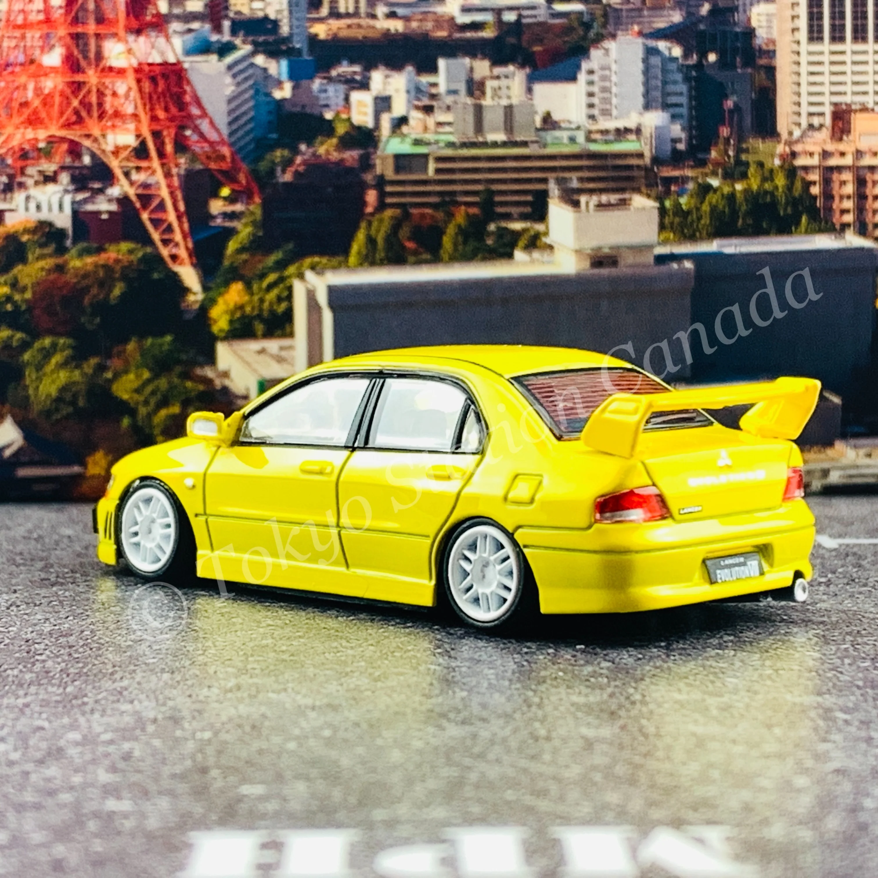 BM CREATIONS JUNIOR 1/64 Mitsubishi Lancer Evolution VII YELLOW RHD with Extra Wheel Set and Lowering Parts 64B0084 - Image 5