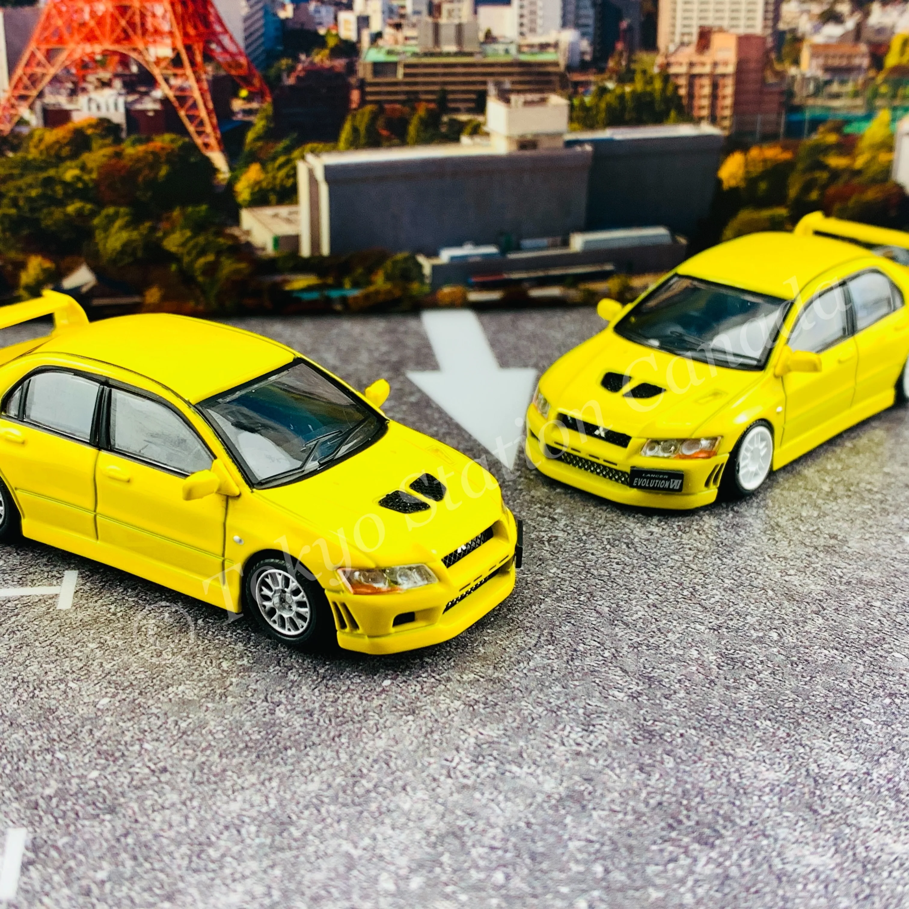 BM CREATIONS JUNIOR 1/64 Mitsubishi Lancer Evolution VII YELLOW RHD with Extra Wheel Set and Lowering Parts 64B0084 - Image 9