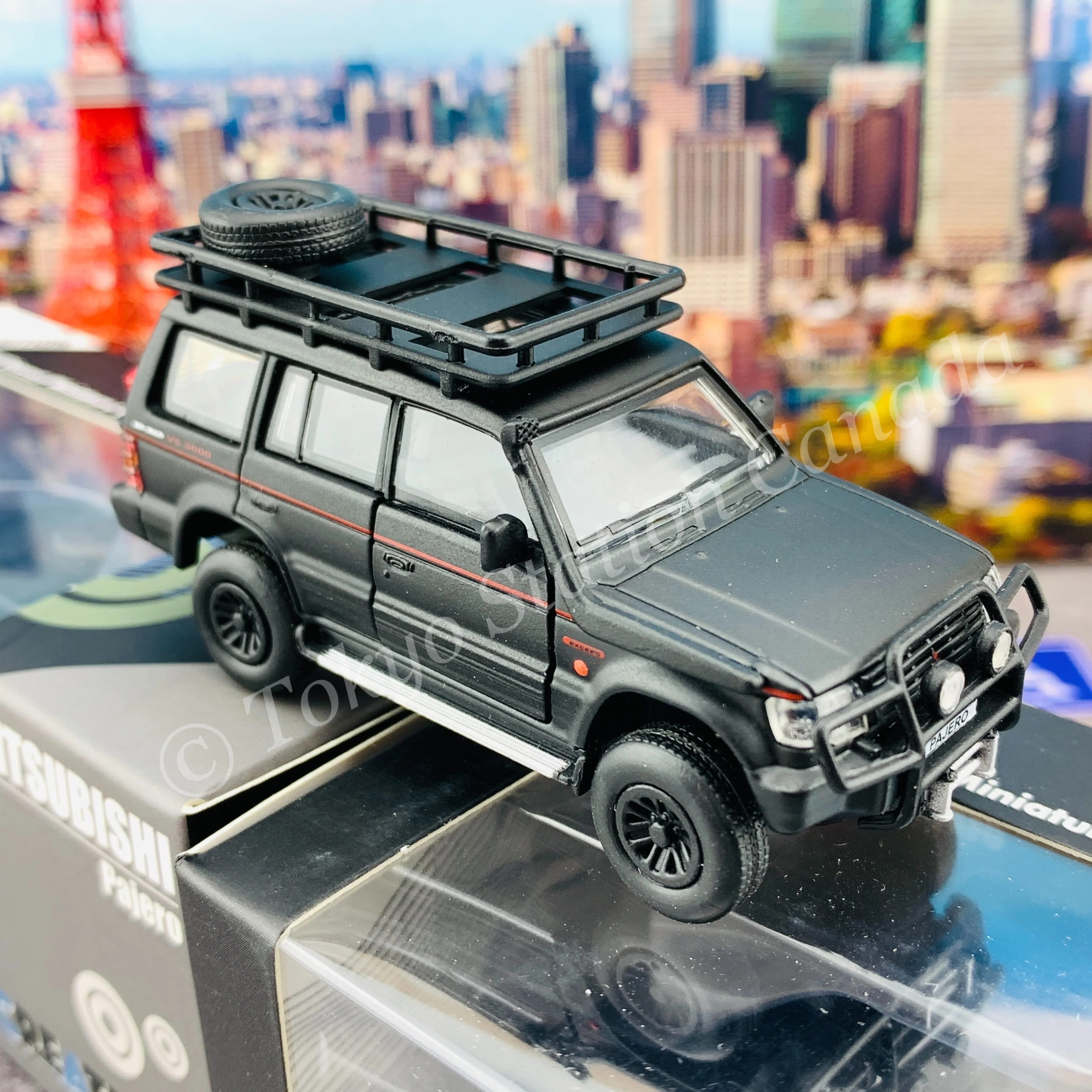 BM CREATIONS JUNIOR 1/64 Mitsubishi Pajero 2nd Generation JUNGLE PACK Matt Black LHD 64B0043 - Image 5