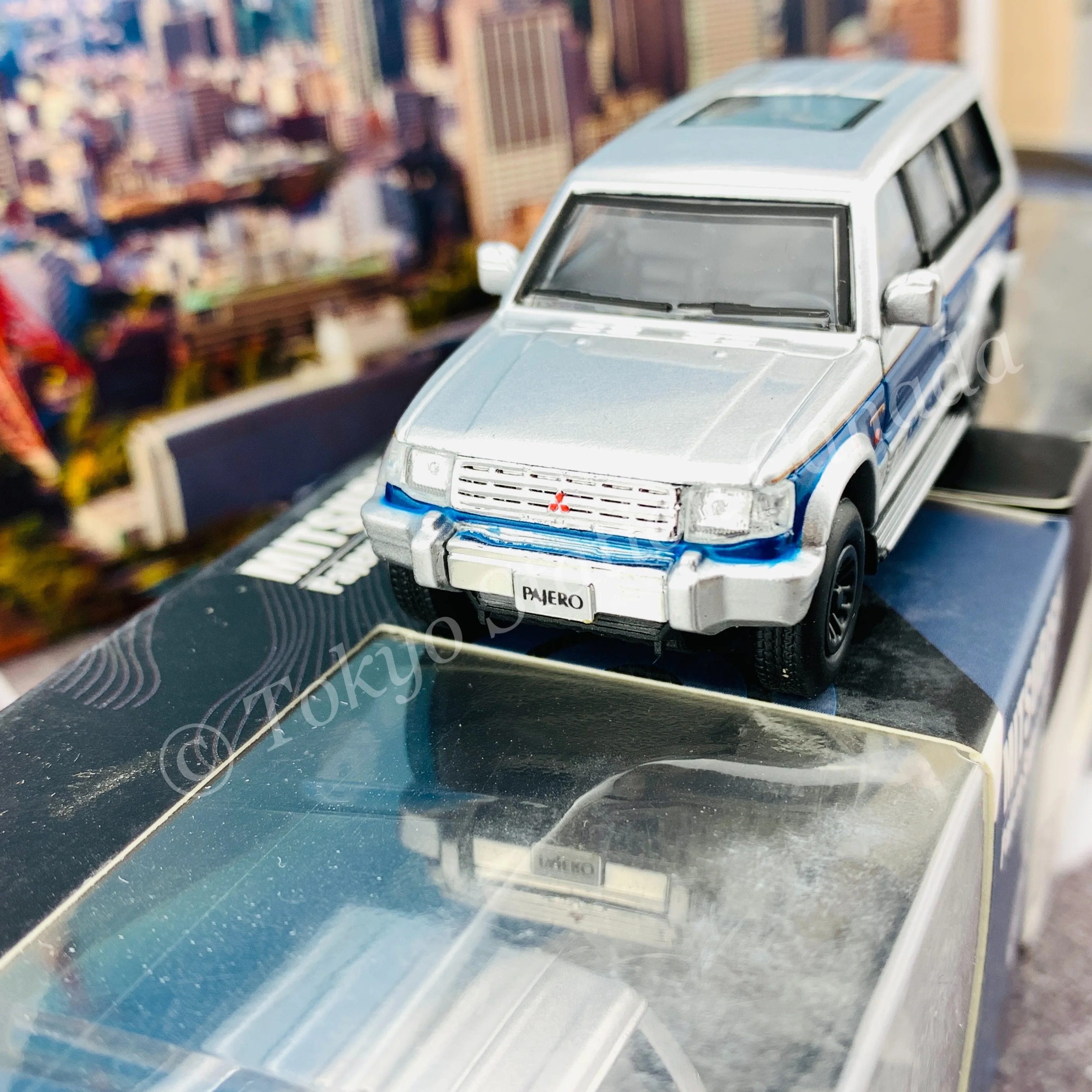 BM CREATIONS JUNIOR 1/64 Mitsubishi Pajero Super Exceed Silver with Blue Stripe LHD 64B0037 - Image 2