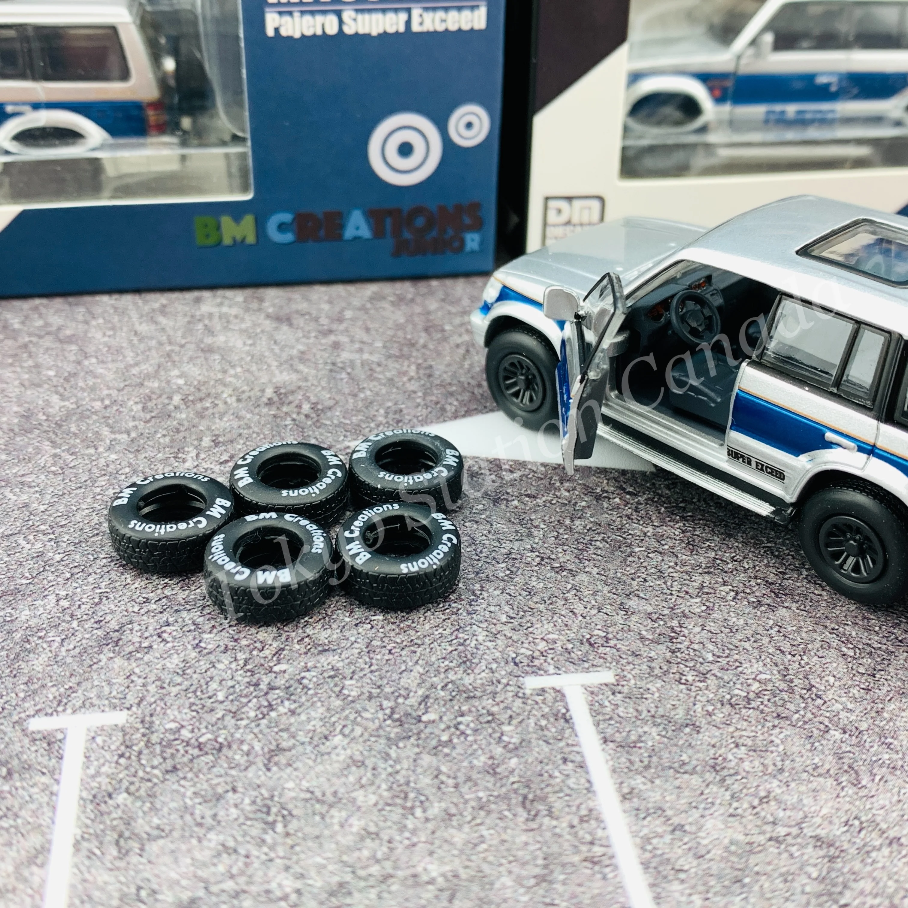 BM CREATIONS JUNIOR 1/64 Mitsubishi Pajero Super Exceed Silver with Blue Stripe LHD 64B0037 - Image 6