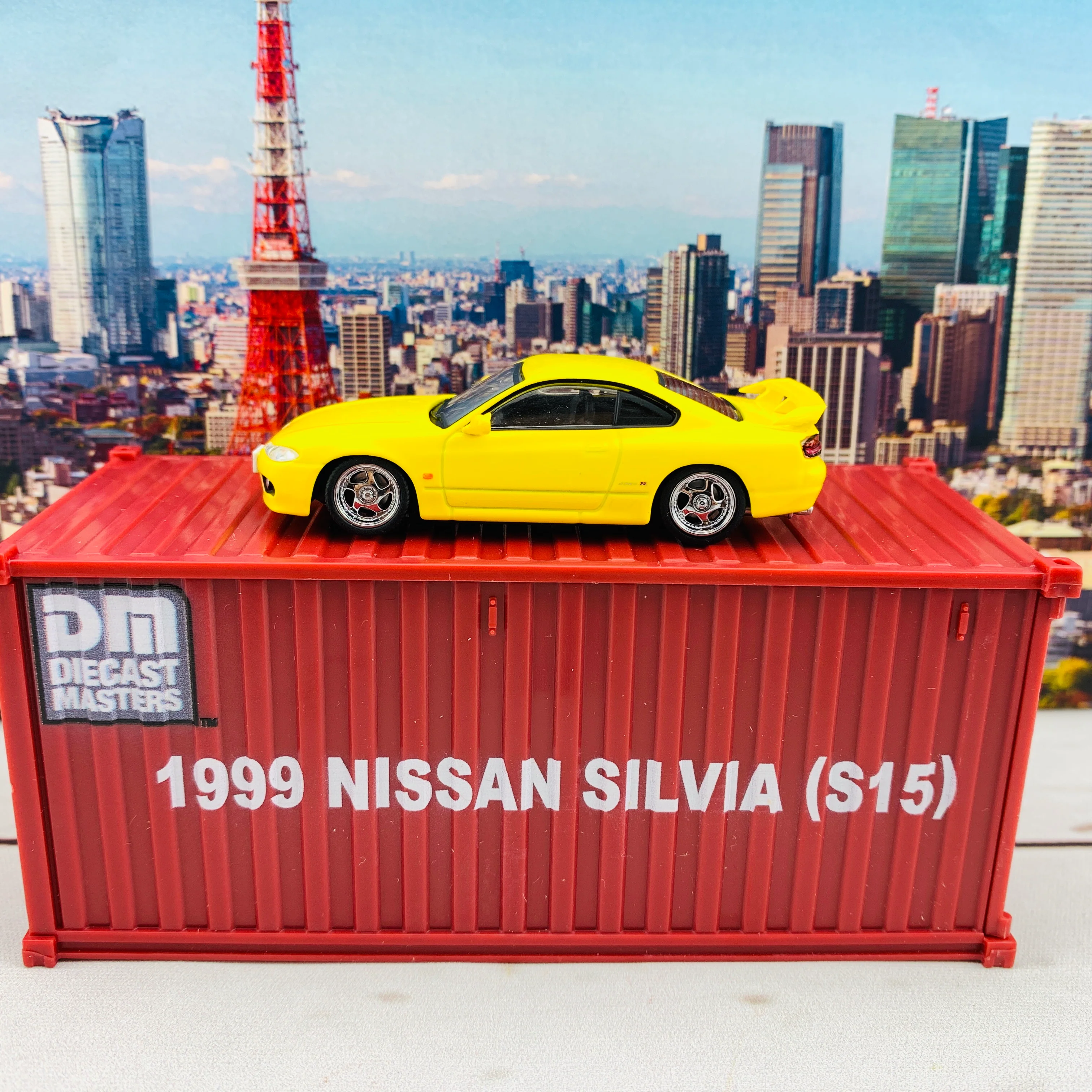 BM Creations JUNIOR 1/64 Nissan Silvia S15 Yellow RHD with Extra Wheels, Lowering Parts and Container Display 64DM64009 - Image 3