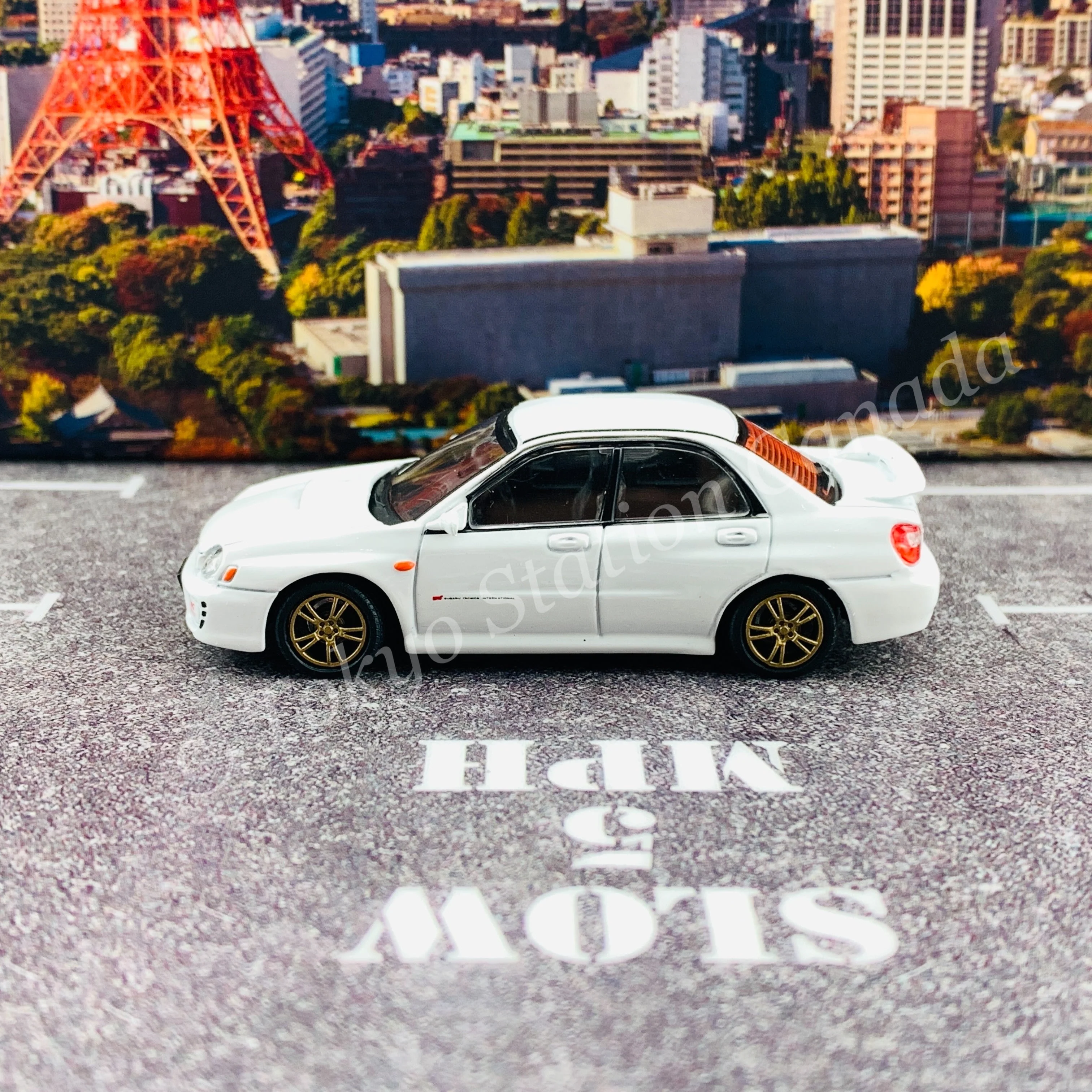 BM CREATIONS JUNIOR 1/64 Subaru Impreza WRX STi 2001 WHITE LHD with Extra Wheel Set and Lowering Parts 64B0083 - Image 3