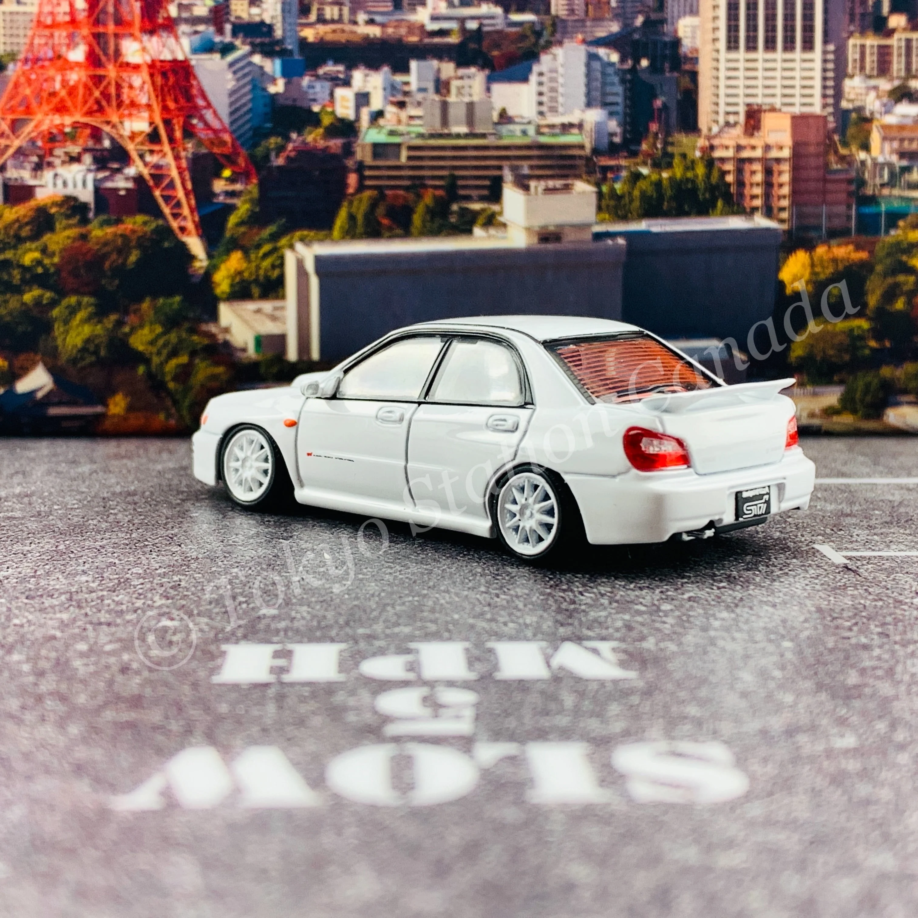 BM CREATIONS JUNIOR 1/64 Subaru Impreza WRX STi 2001 WHITE LHD with Extra Wheel Set and Lowering Parts 64B0083 - Image 6