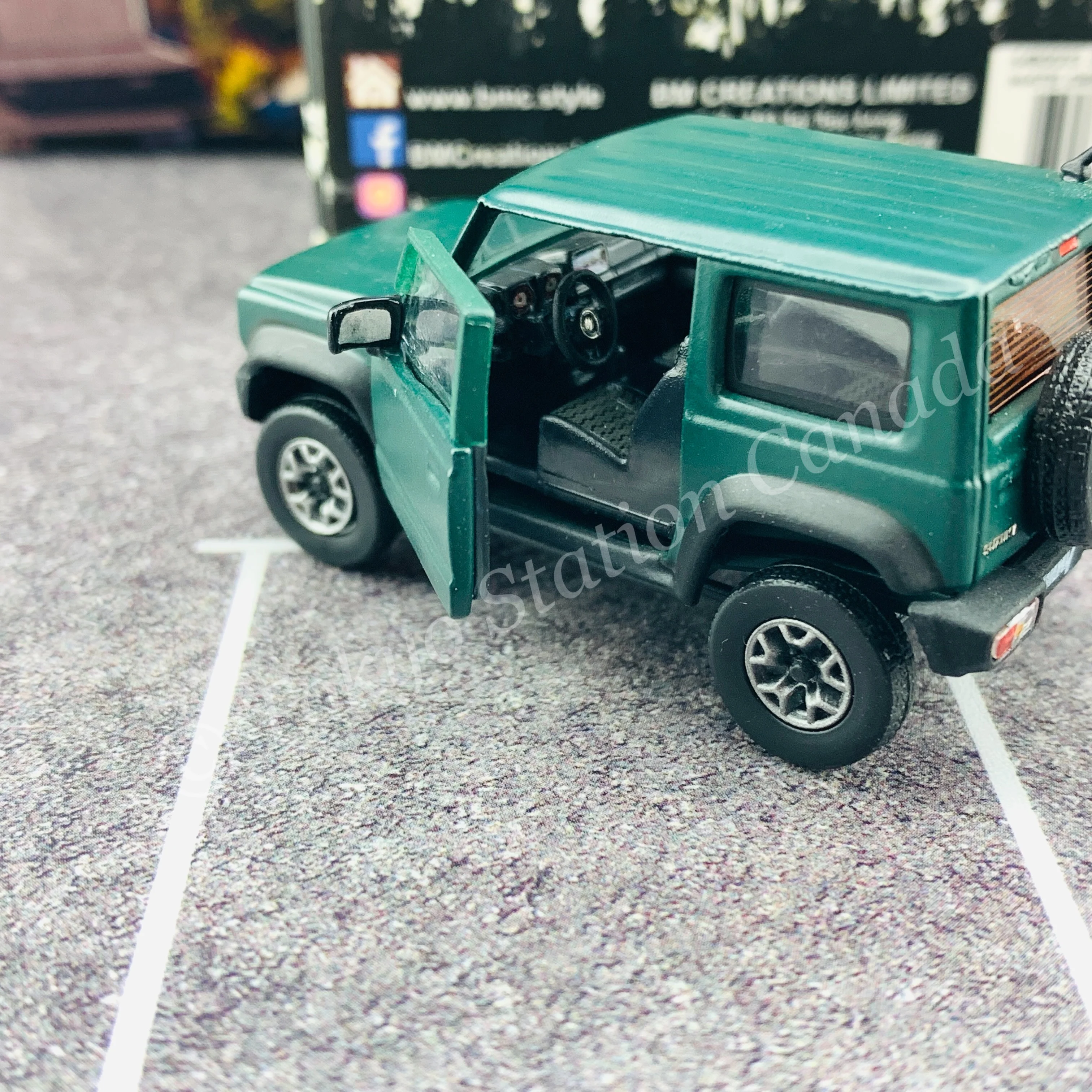 BM CREATIONS JUNIOR 1/64 Suzuki Jimny SIERRA JB74 with Accessory Pack Matt Green LHD 64B0033 - Image 4