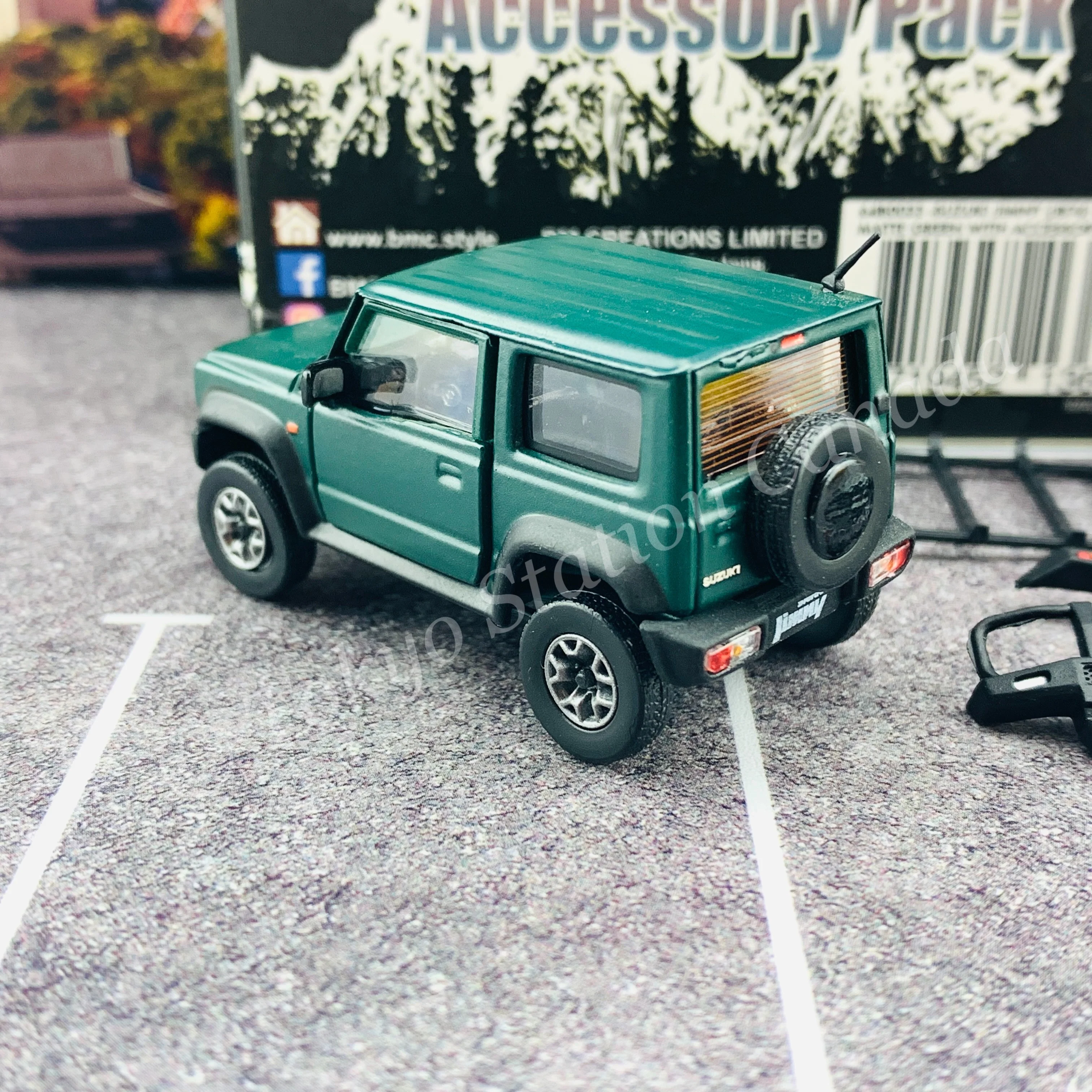 BM CREATIONS JUNIOR 1/64 Suzuki Jimny SIERRA JB74 with Accessory Pack Matt Green LHD 64B0033 - Image 5