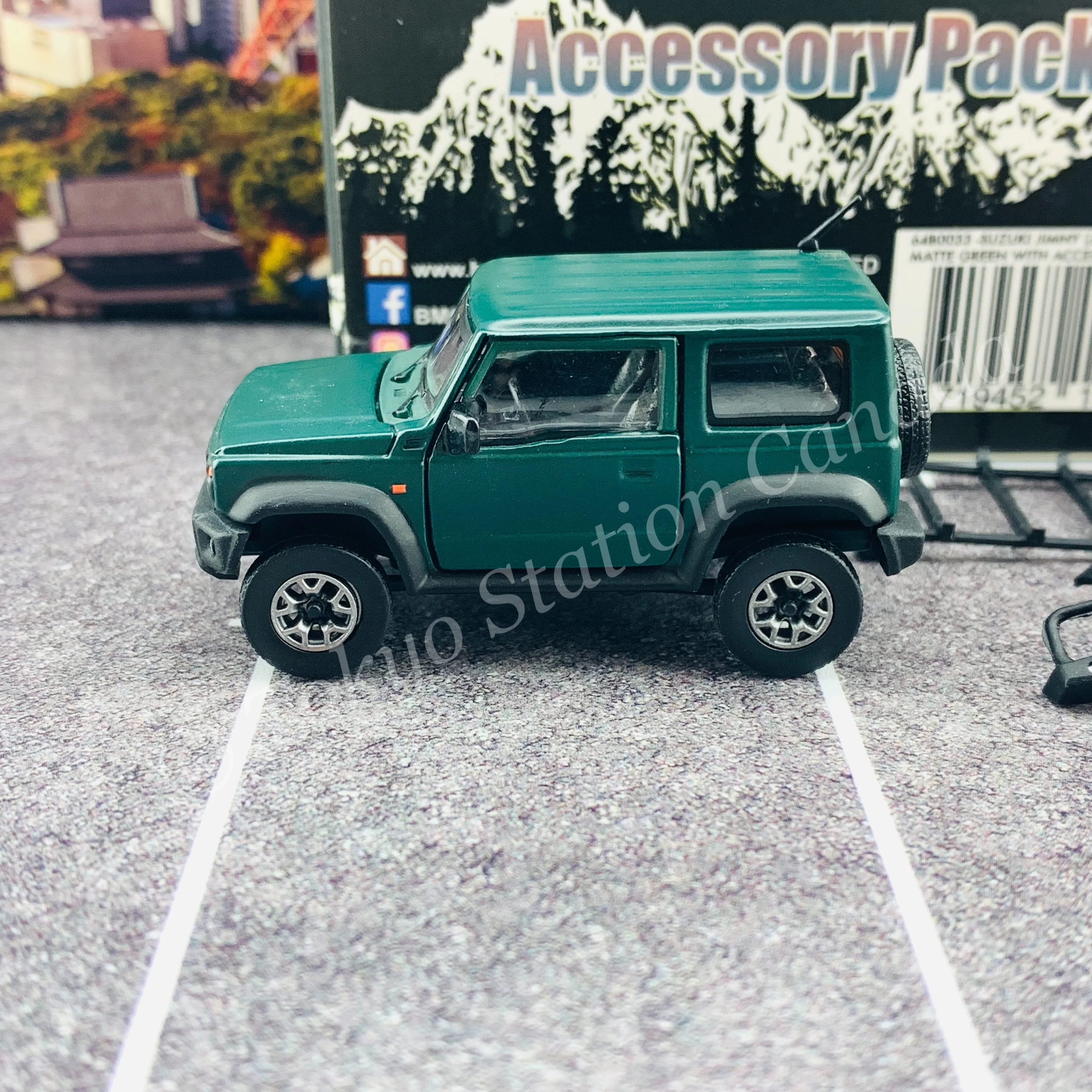 BM CREATIONS JUNIOR 1/64 Suzuki Jimny SIERRA JB74 with Accessory Pack Matt Green LHD 64B0033 - Image 7