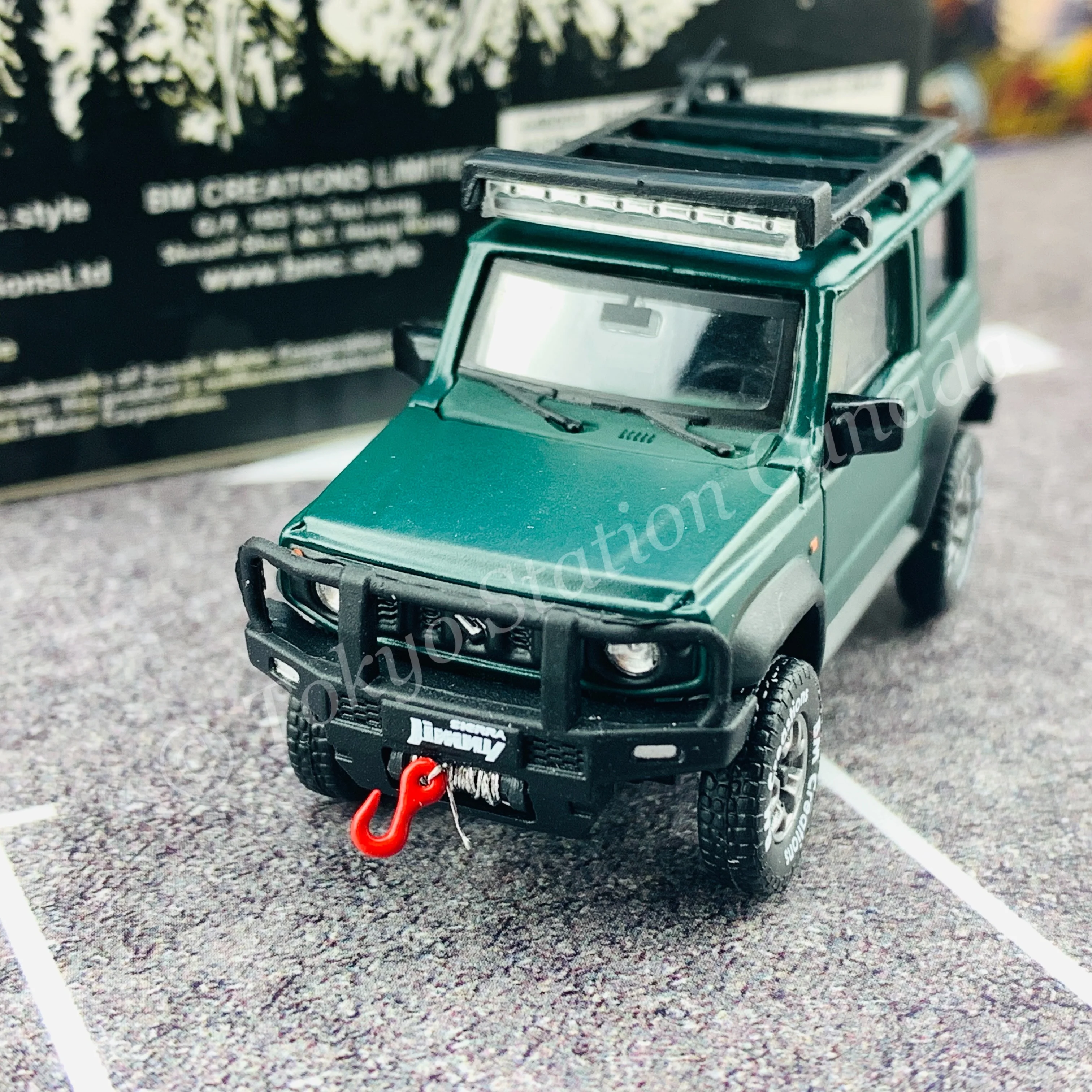 BM CREATIONS JUNIOR 1/64 Suzuki Jimny SIERRA JB74 with Accessory Pack Matt Green LHD 64B0033 - Image 9