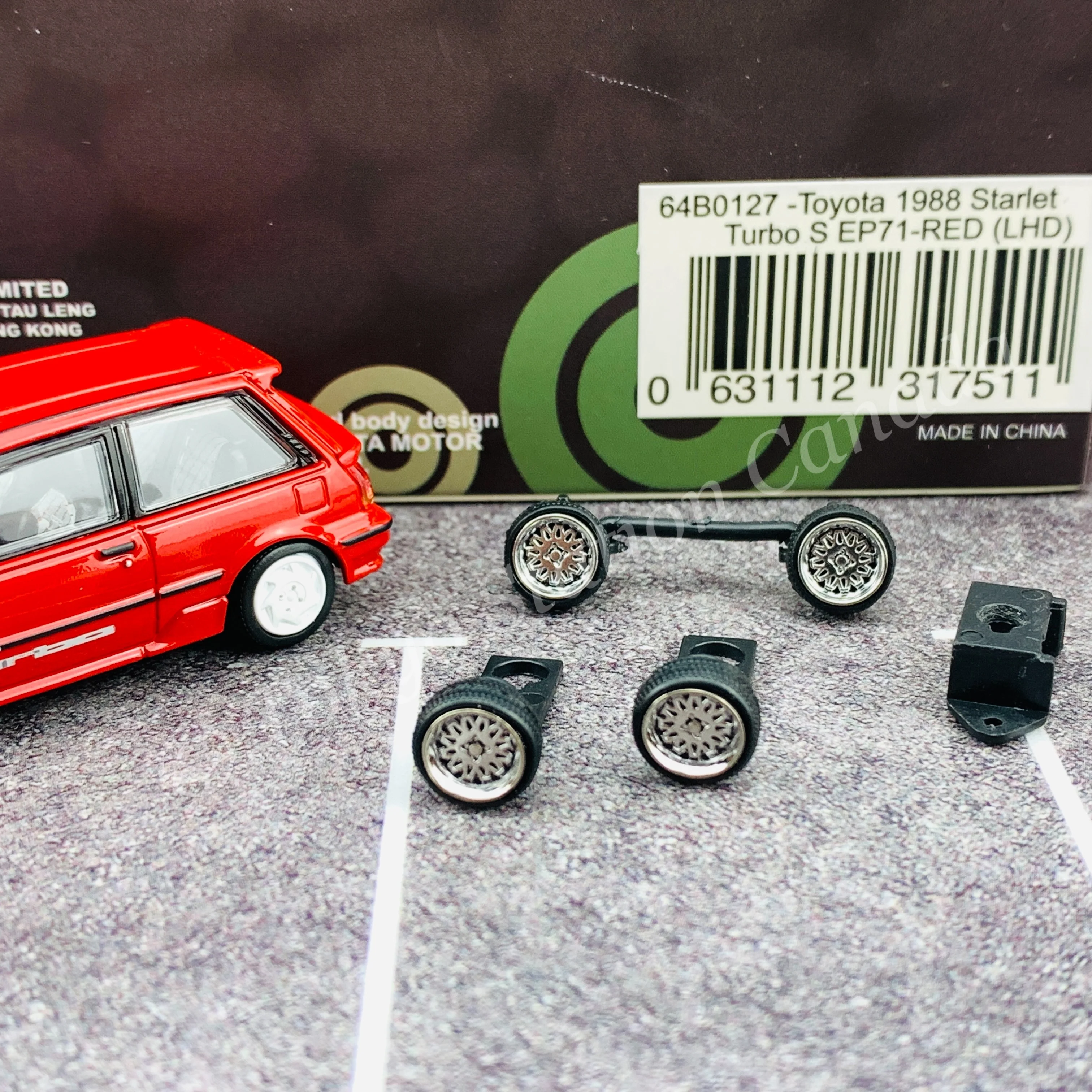 BM CREATIONS JUNIOR 1/64 Toyota 1988 Starlet Turbo S EP71 Red LHD with Extra Wheel and Lowering Parts Set 64B0127 - Image 2