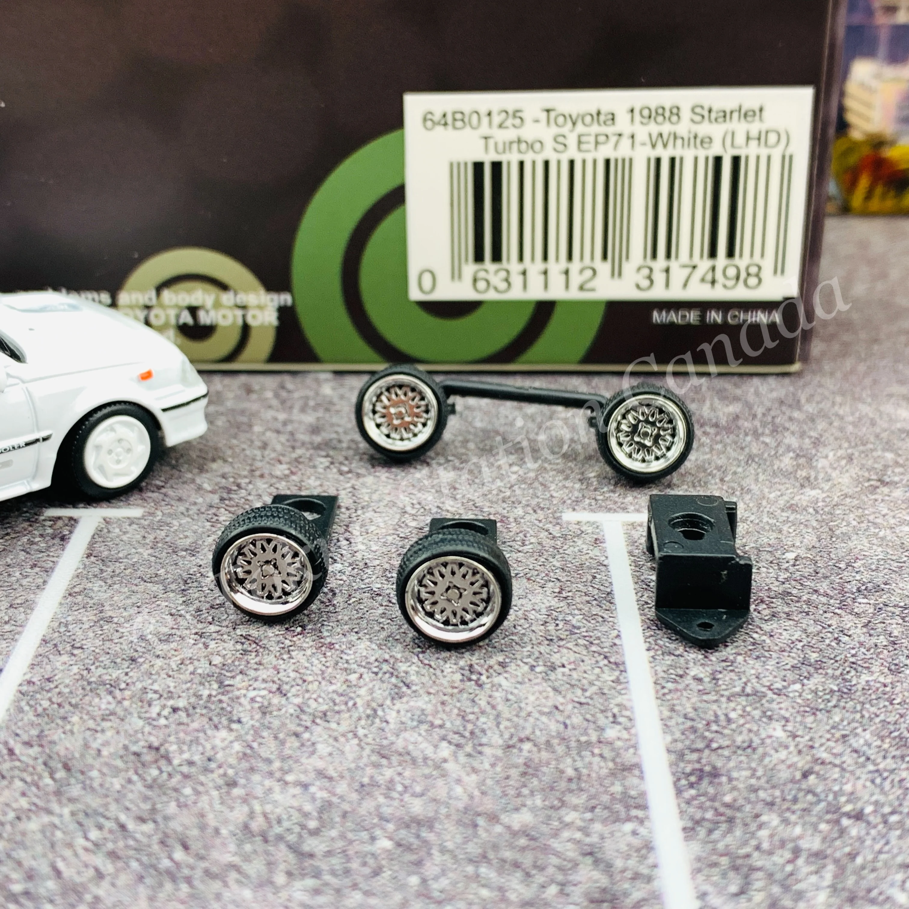 BM CREATIONS JUNIOR 1/64 Toyota 1988 Starlet Turbo S EP71 White LHD with Extra Wheel and Lowering Parts Set 64B0125 - Image 2