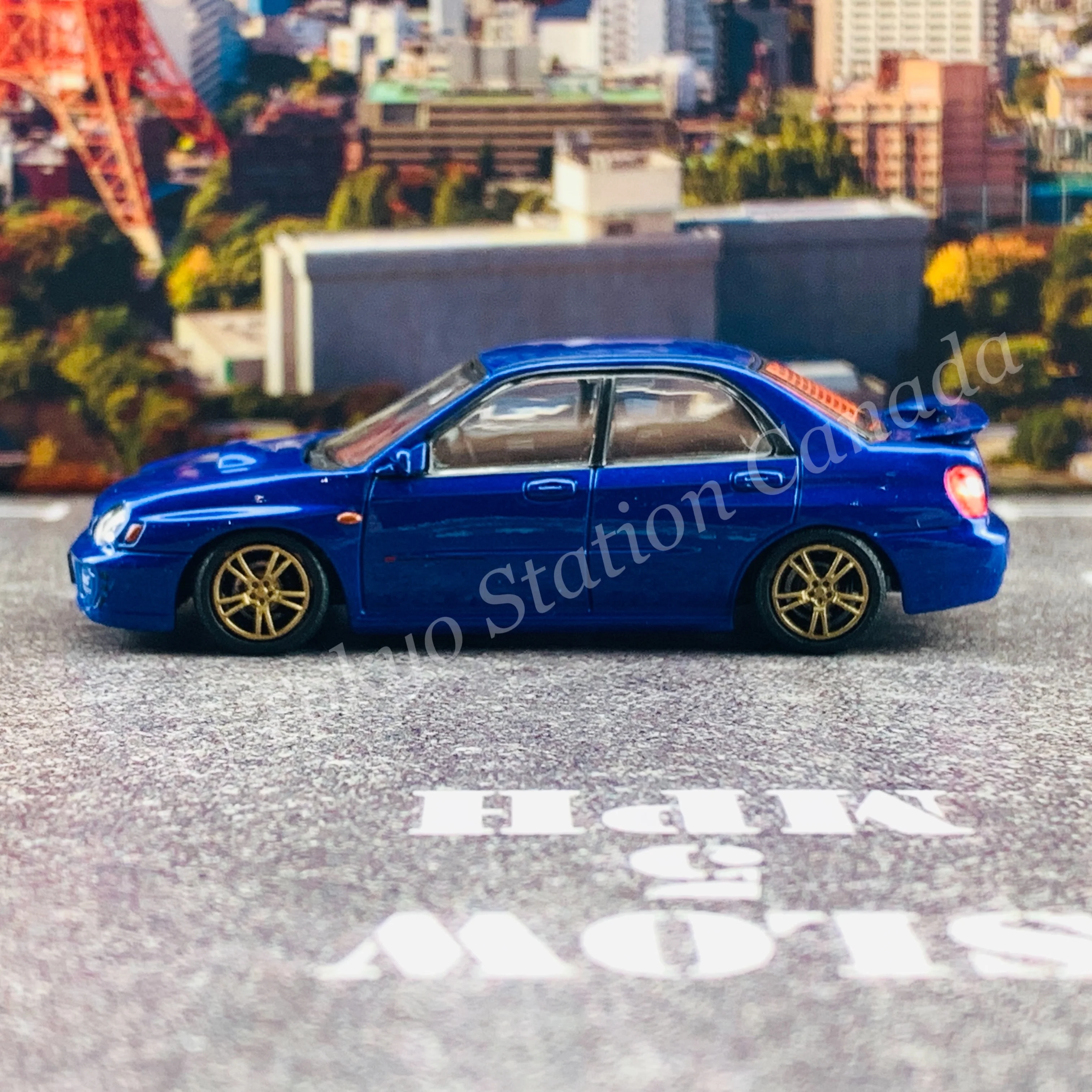 BM CREATIONS JUNIOR 1/64 Subaru Impreza WRX STi 2001 BLUE RHD with Extra Wheel Set and Lowering Parts 64B0078 - Image 3