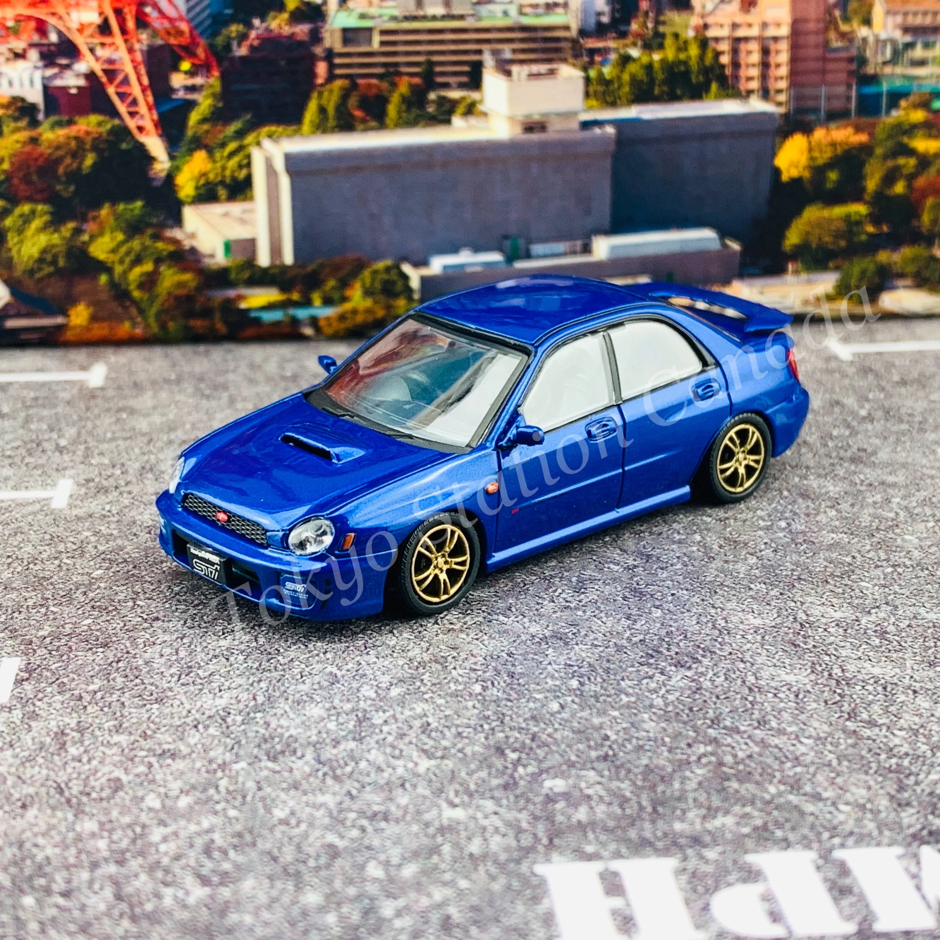 BM CREATIONS JUNIOR 1/64 Subaru Impreza WRX STi 2001 BLUE RHD with Extra Wheel Set and Lowering Parts 64B0078 - Image 4