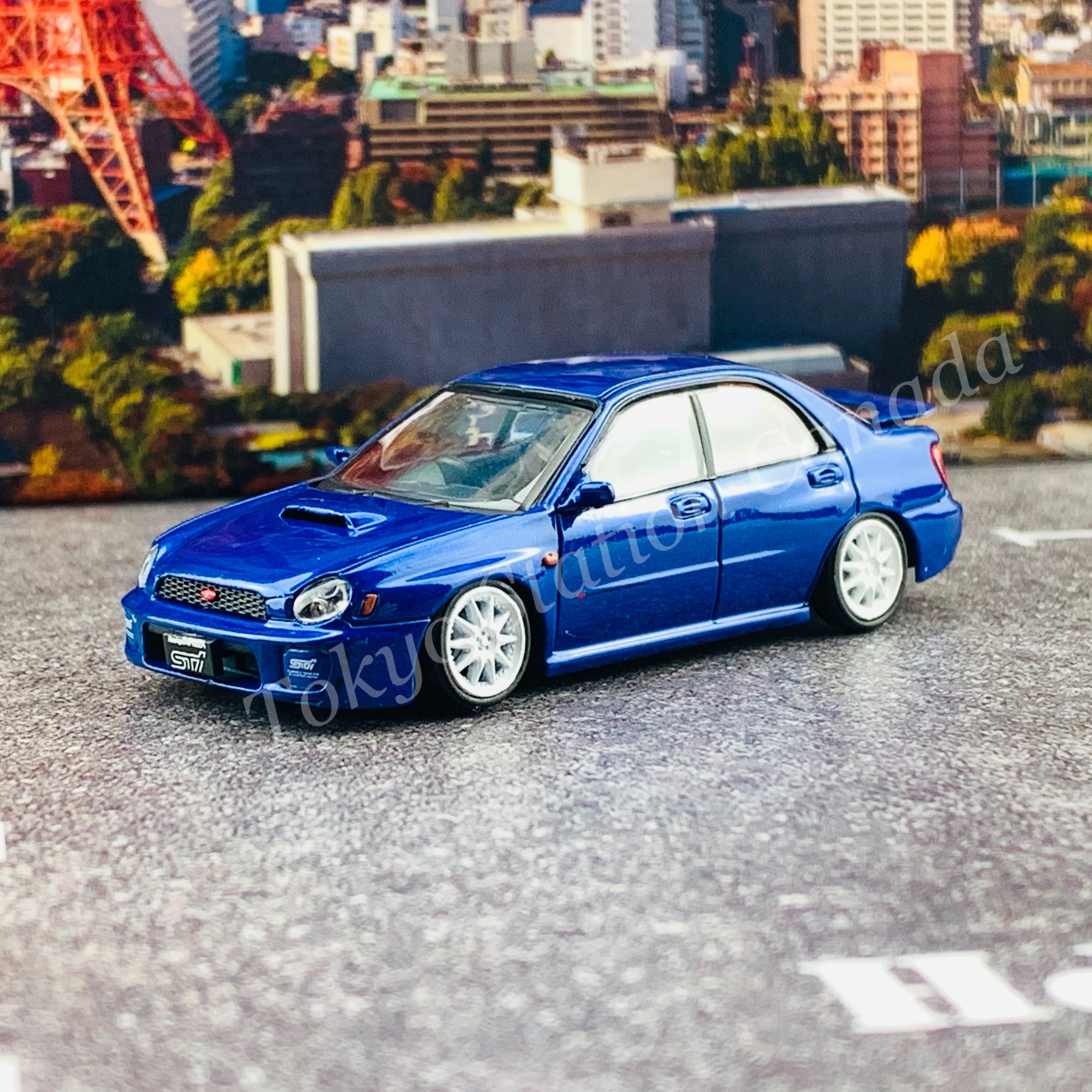BM CREATIONS JUNIOR 1/64 Subaru Impreza WRX STi 2001 BLUE RHD with Extra Wheel Set and Lowering Parts 64B0078 - Image 7
