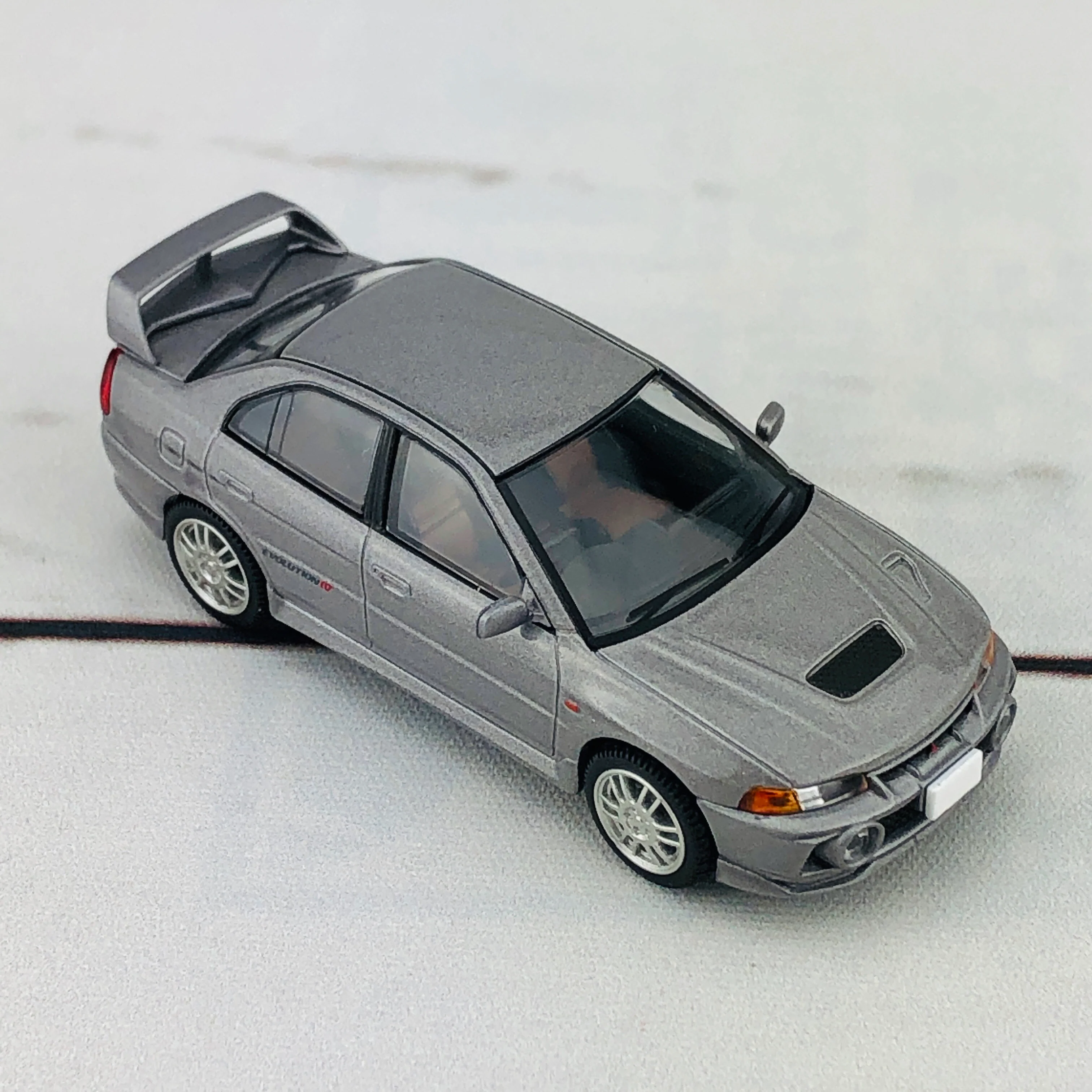 Tomica Limited Vintage Neo Mitsubishi Lancer Evolution IV GSR Silver (1996) LV-N186a - Image 8