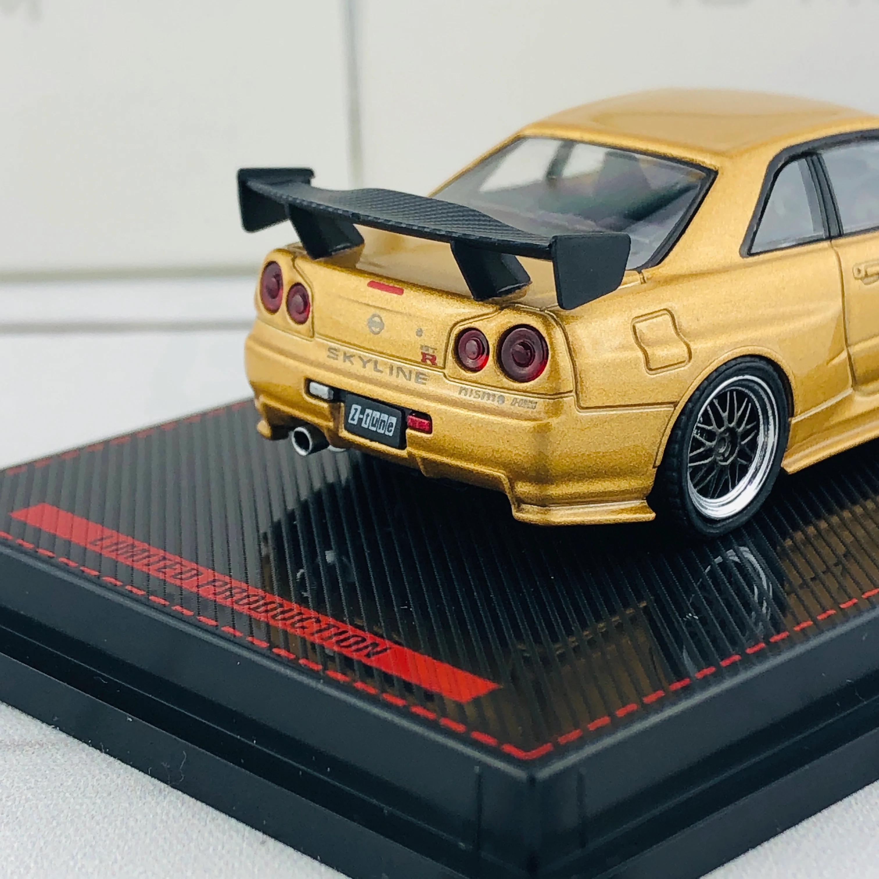 Ignition Model 1/64 Nismo R34 GTR Z-tune Gold 1875 - Image 6