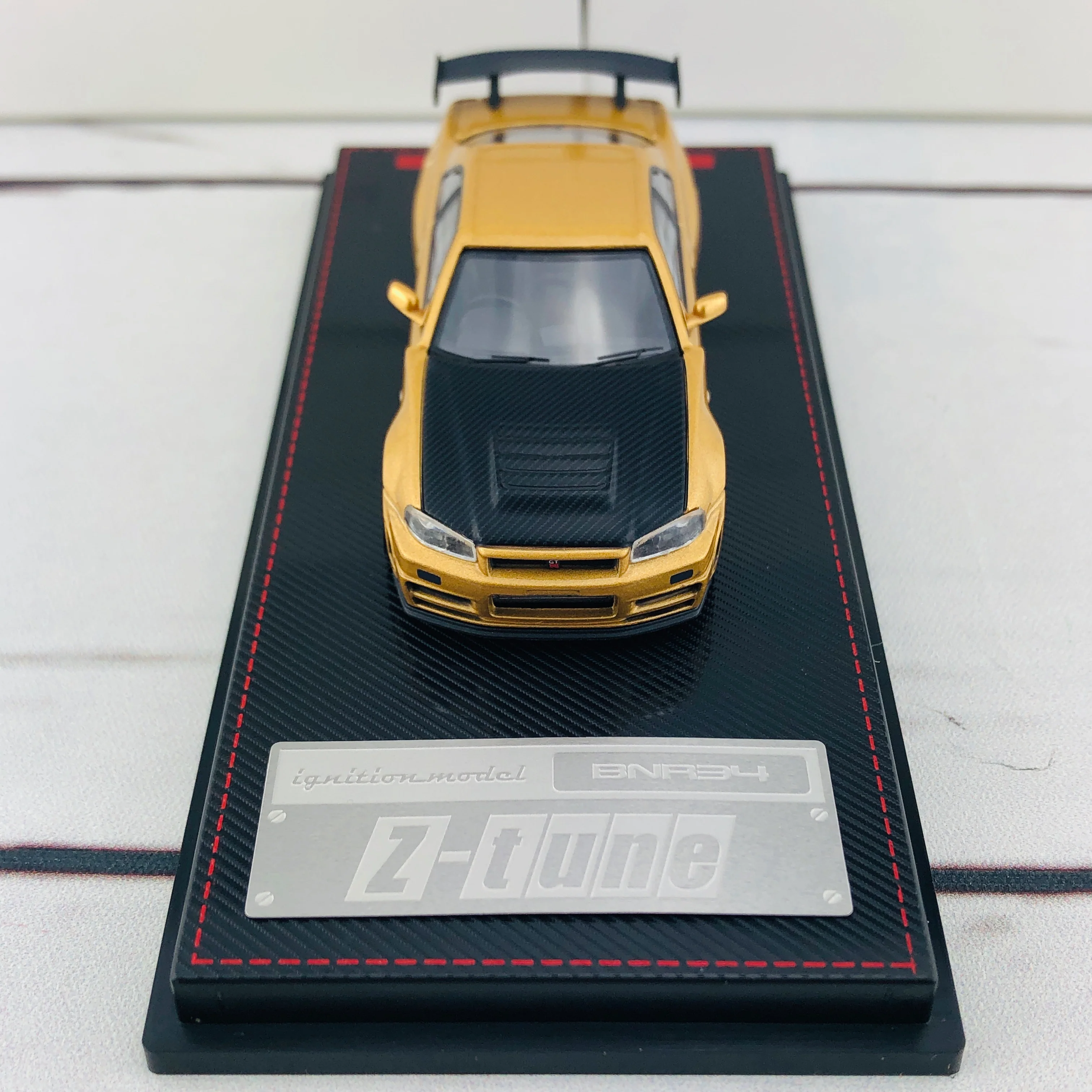 Ignition Model 1/64 Nismo R34 GTR Z-tune Gold 1875 - Image 9