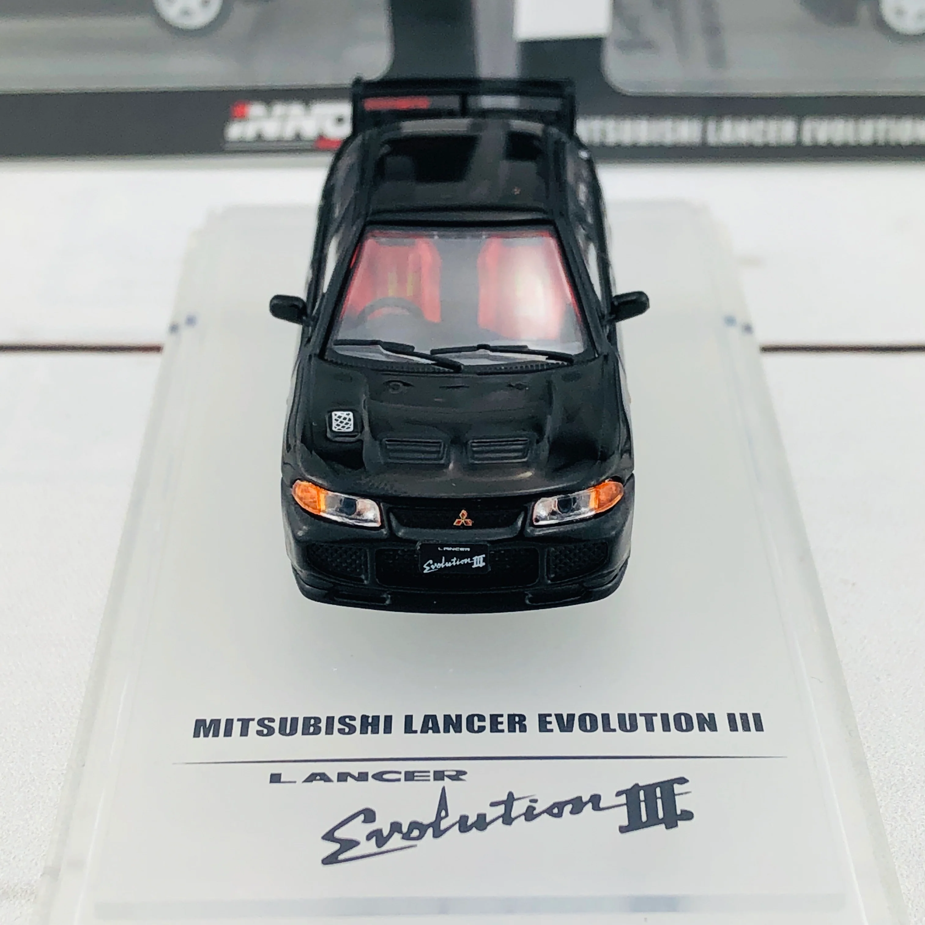 INNO64 Mitsubishi Lancer Evolution III with Extra Wheel Set IN64-EVO3-BLA - Image 7