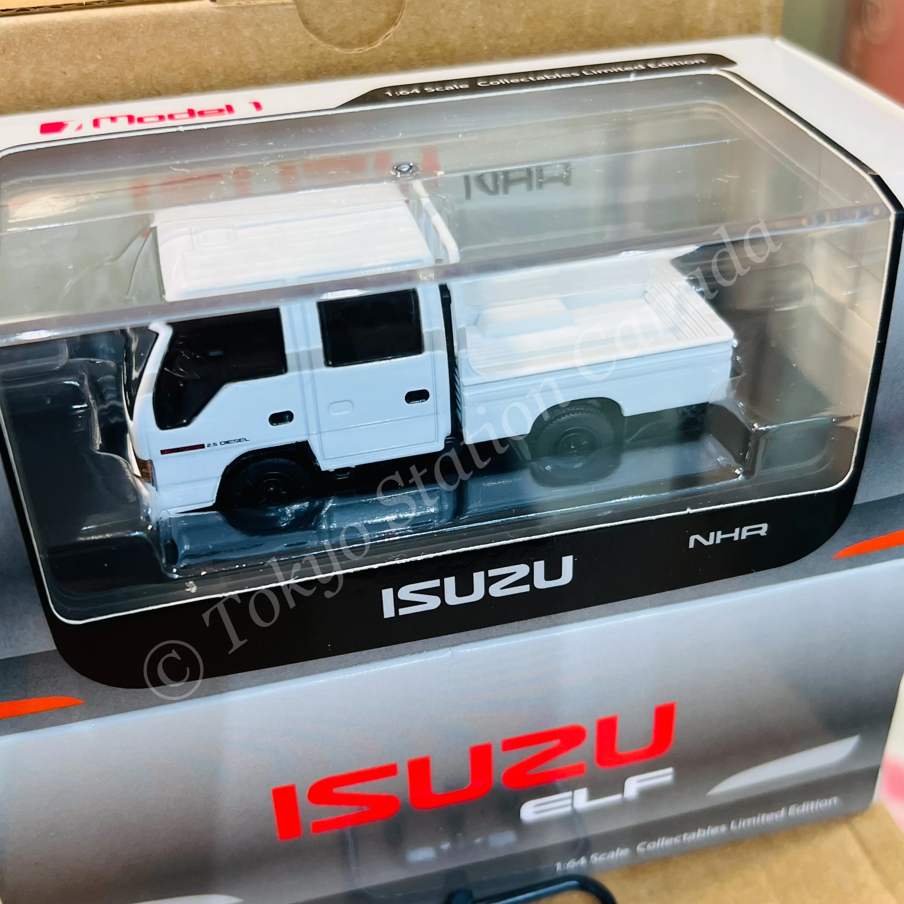 Model 1 1/64 Isuzu ELF NHR Custom Version White with Black Wheels LHD T66640 - Image 2