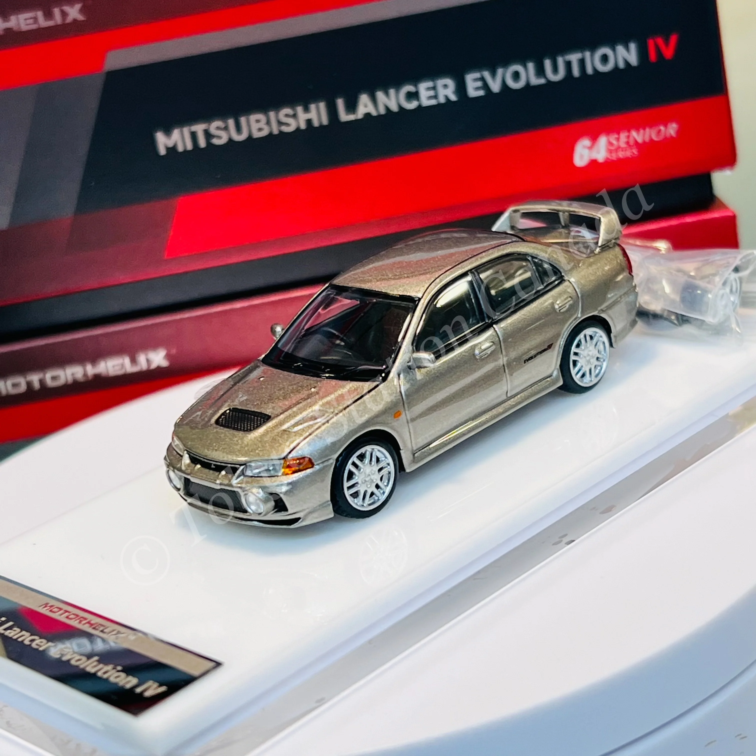 MOTORHELIX 64SENIOR SERIES 1/64 Mitsubishi Lancer Evolution IV Steel Silver Metallic M64001 - Image 2