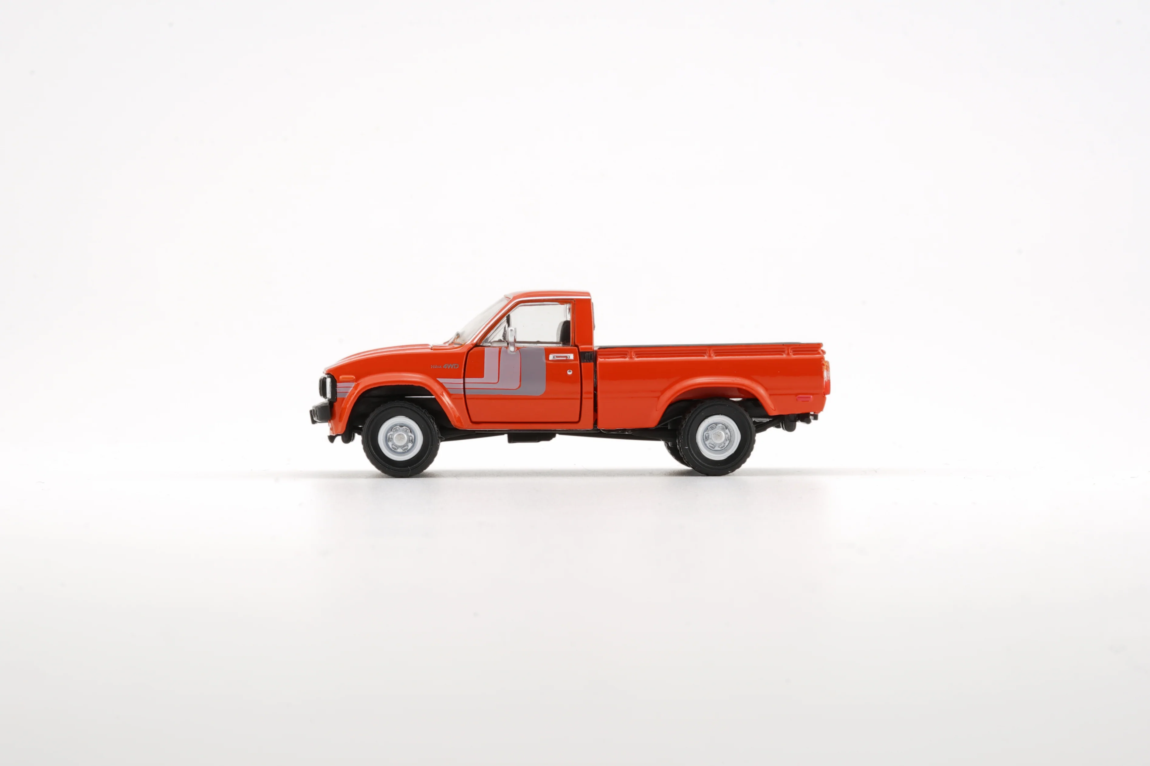 BM Creations 1/64 Toyota 1980 Hilux N60, N70 Orange (LHD) 64B0266 - Image 2