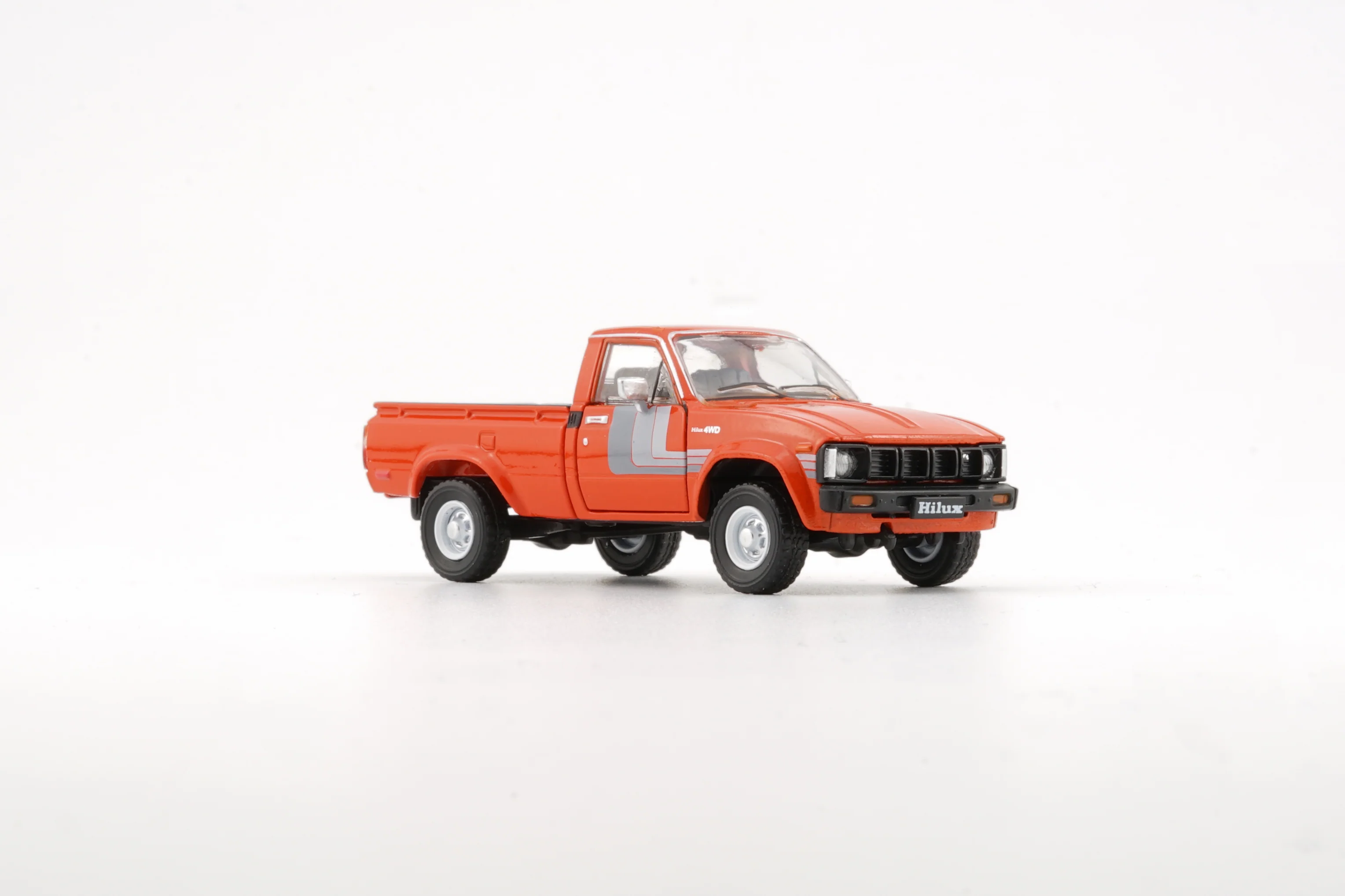 BM Creations 1/64 Toyota 1980 Hilux N60, N70 Orange (LHD) 64B0266 - Image 4