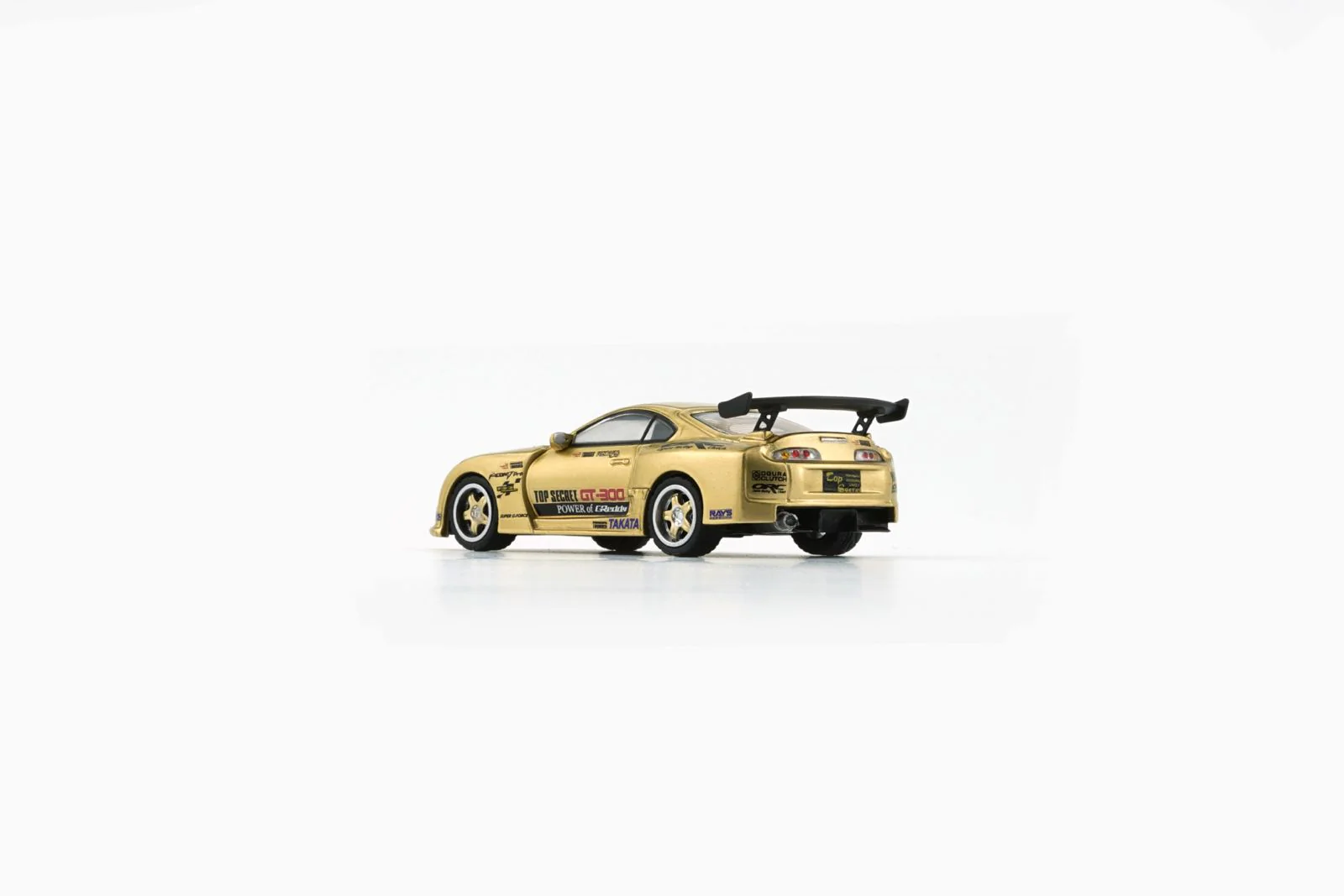 BM Creations 1/64 TOP SECRET Supra (JZA80) Gold HK Toycar Salon 2024 Edition 64B0429 - Image 4