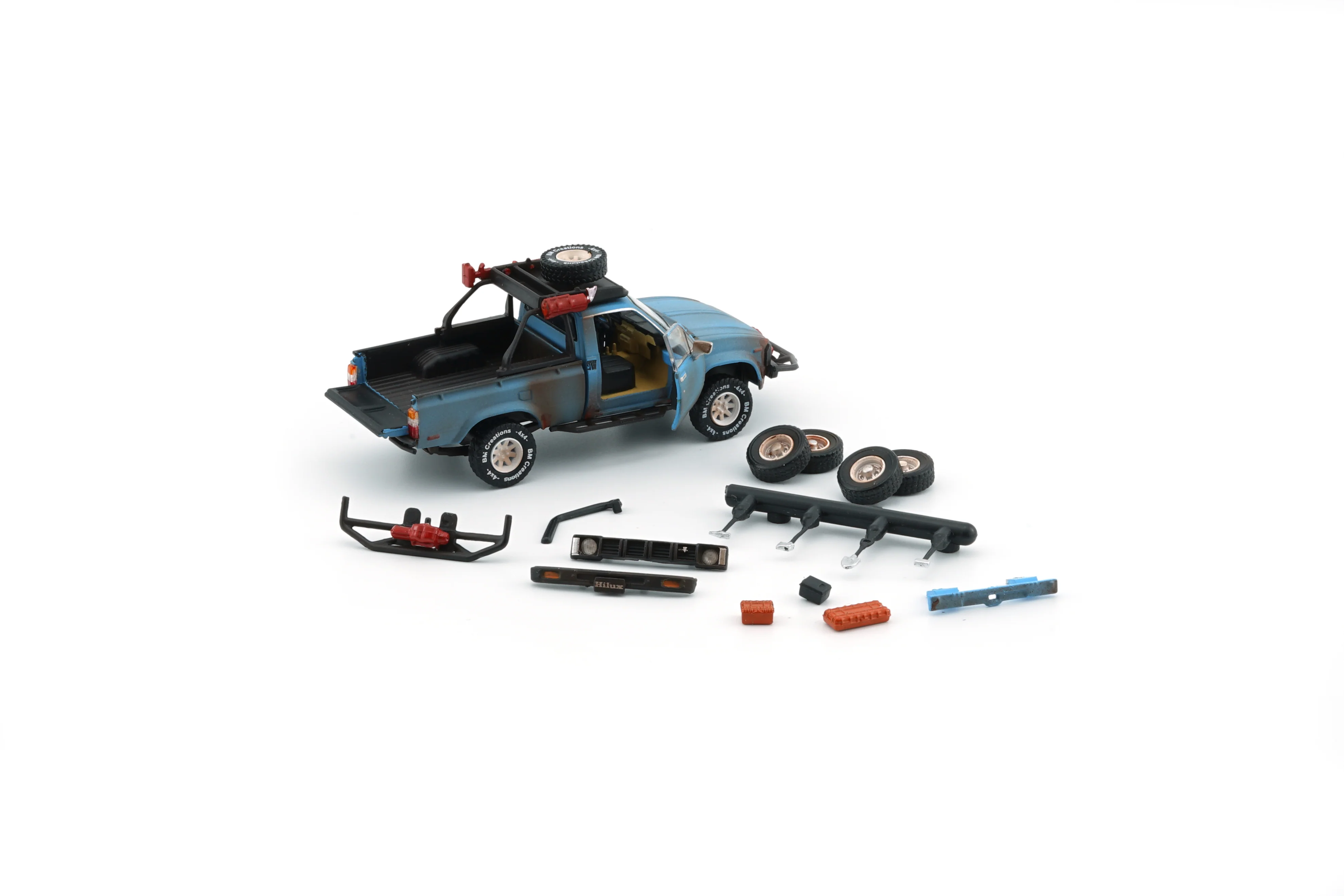 BM Creations 1/64 Toyota 1980 Hilux N60, N70 Matte Rusting Blue w/Accessories 64B0361 - Image 3