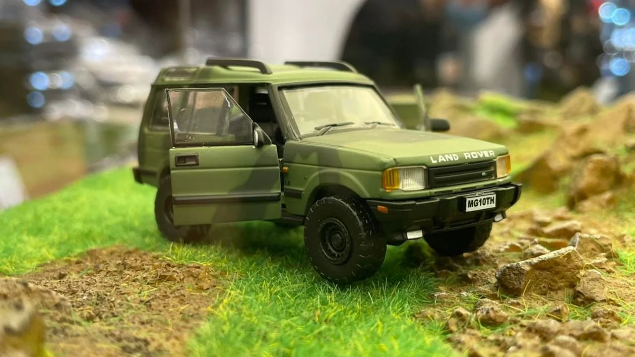 BM CREATIONS JUNIOR 1/64 Land Rover 1998 Discovery 1 Military Camouflage with Oil Tank (MG Edition) RHD 64B0195 - Image 2
