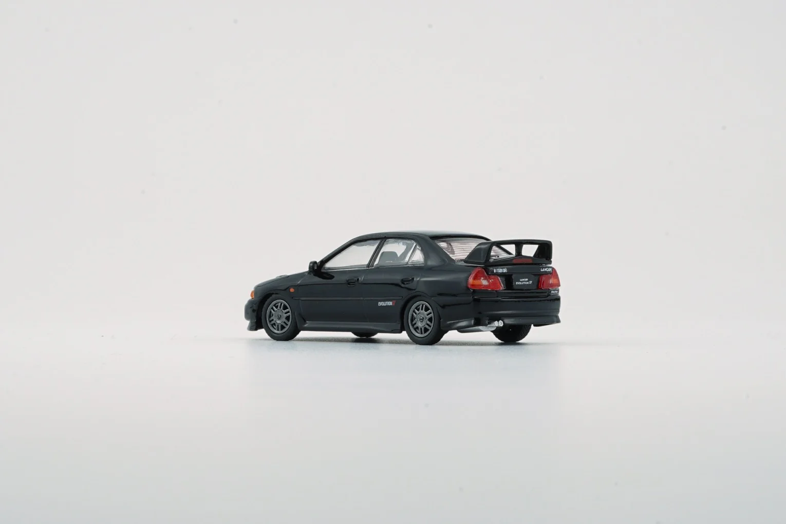 BM CREATIONS JUNIOR 1/64 Mitsubishi Lancer EVO IV BLACK LHD 64B0280 - Image 3