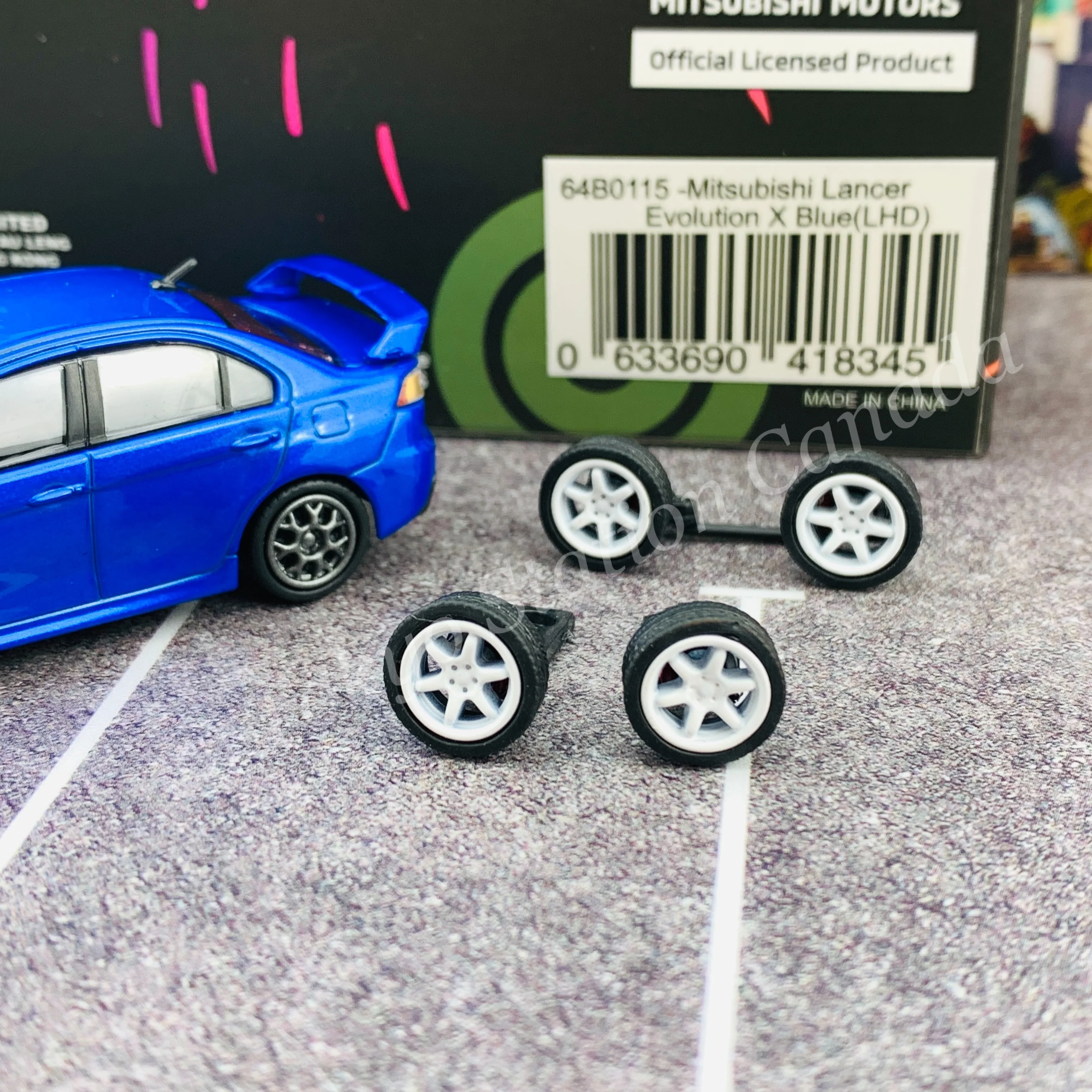 BM CREATIONS JUNIOR 1/64 Mitsubishi Lancer EVO X BLUE LHD with Extra Wheels and Lowering Parts 64B0115 - Image 2