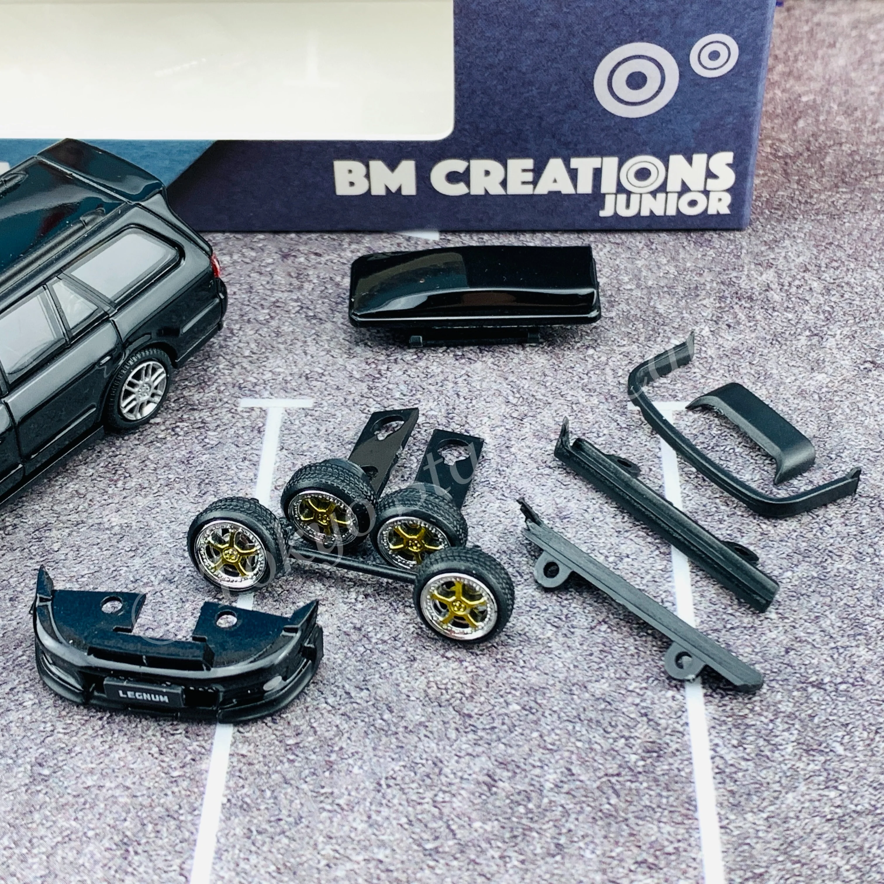 BM Creations JUNIOR 1/64 Mitsubishi Legnum VR4 BLACK RHD with Extra Wheels, Lowering Parts 64B0156 - Image 4