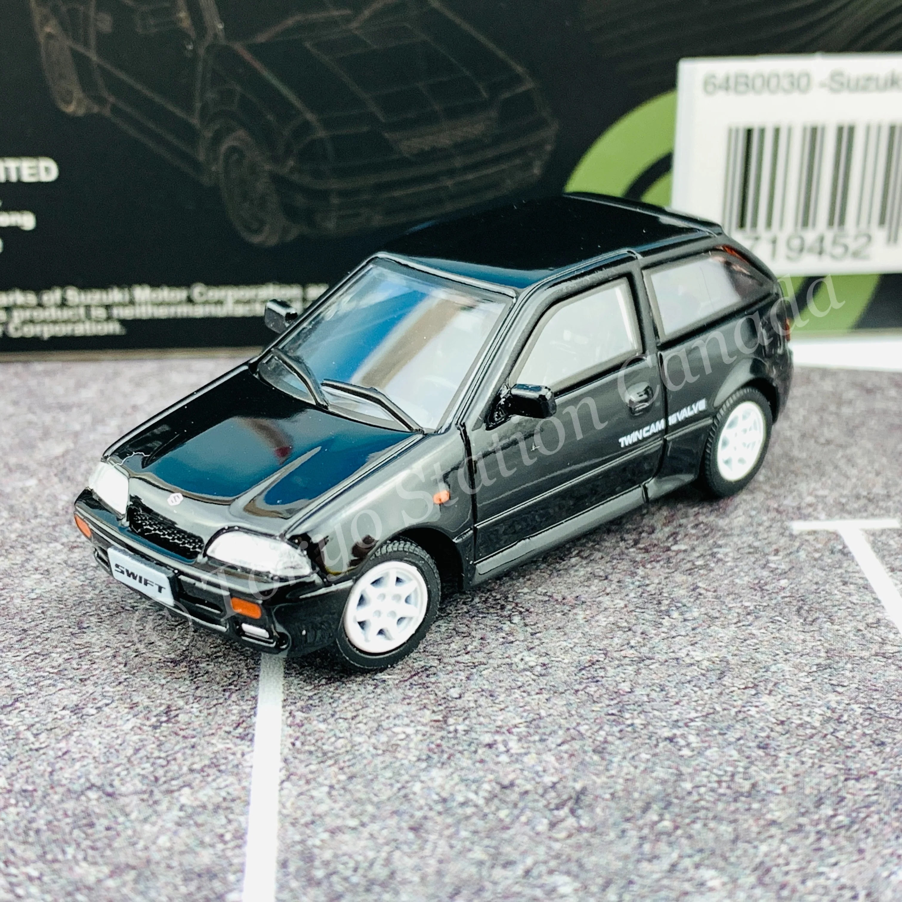 BM CREATIONS JUNIOR 1/64 Suzuki Swift 1989 BLACK LHD with Extra Wheels, Lowering Parts 64B0030 - Image 2