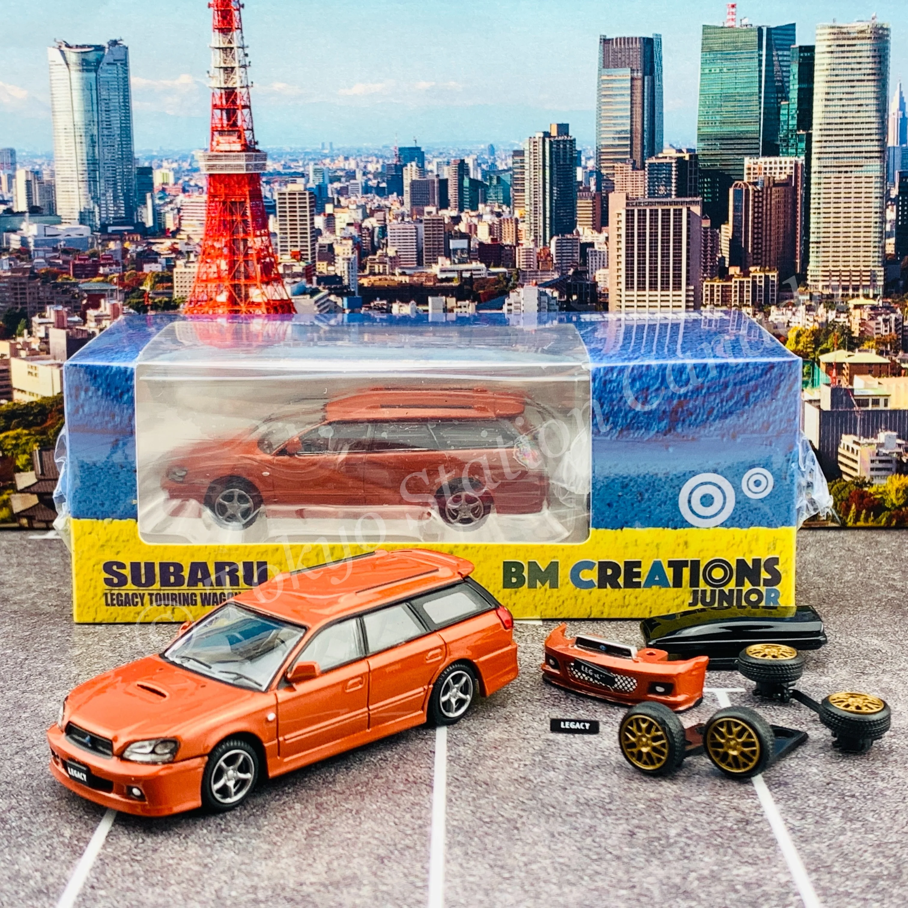 BM Creations JUNIOR 1/64Subaru 2002 Legacy E-tune II ORANGE RHD with Extra Wheels, Lowering Parts 64B0152
