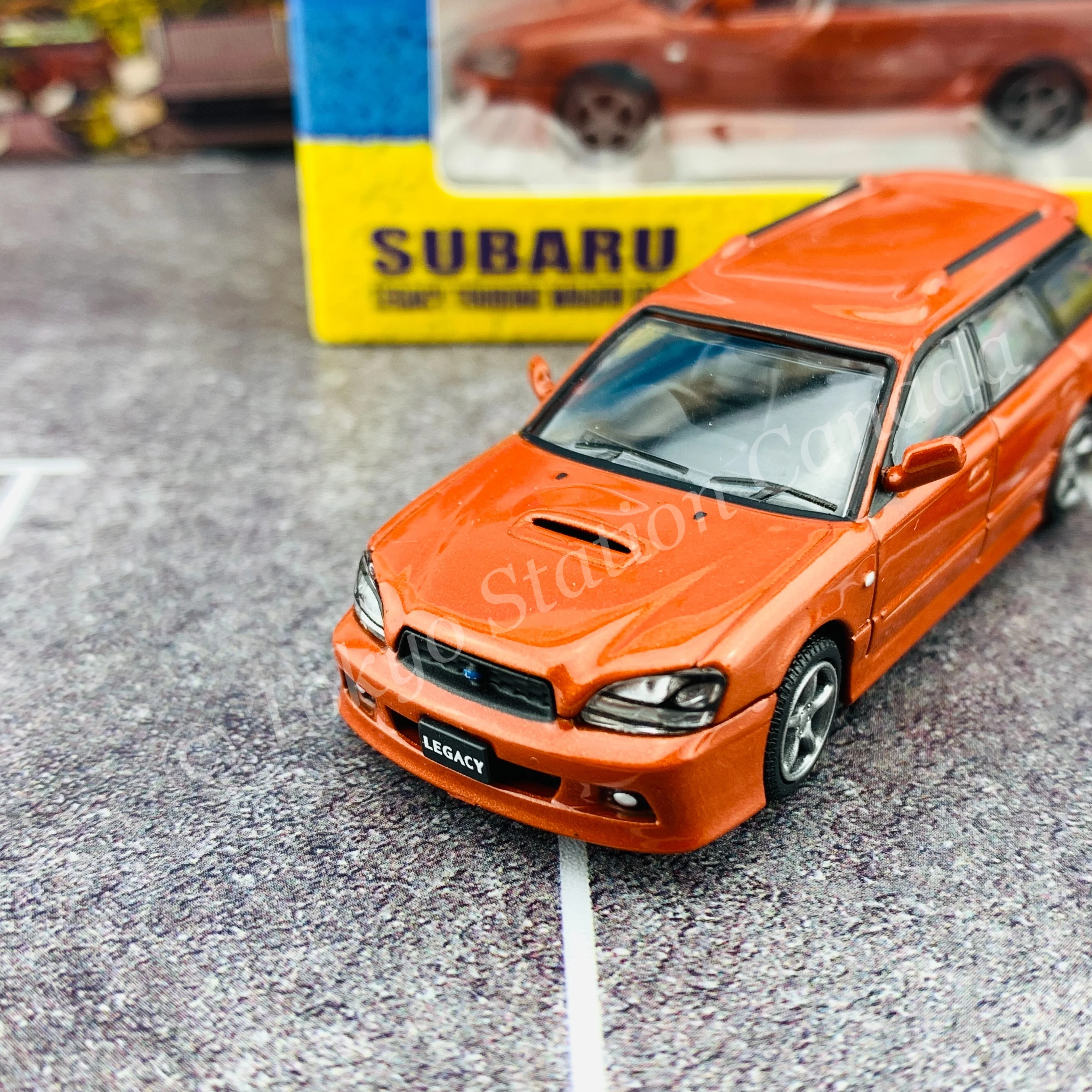 BM Creations JUNIOR 1/64Subaru 2002 Legacy E-tune II ORANGE RHD with Extra Wheels, Lowering Parts 64B0152 - Image 5
