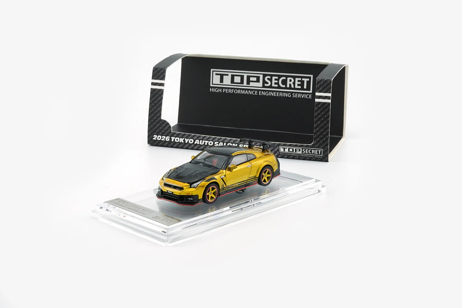 PREORDER KKK 1/64 Top Secret R35 GT-R GOLD with Carbon Bonnet (TAS Tokyo 2026 Limited Version) RHD Top Secret official licensed / Number Plated) 64B0494 (Approx. release in Q3 2026 and subject to the manufacturer's final decision) - Image 3