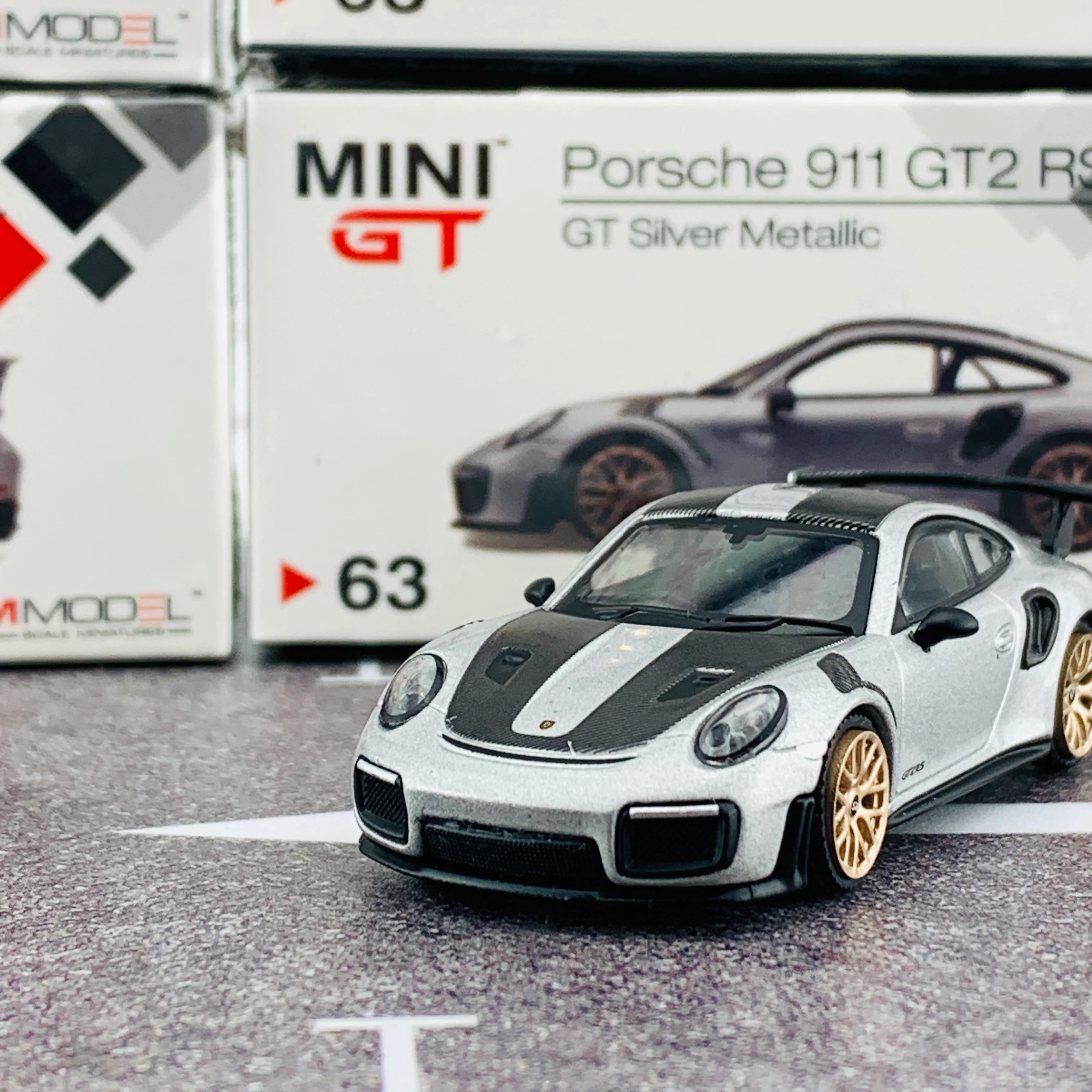MINI GT 1/64 Porsche 911 Turbo GT2 RS GT Weissach Package Silver Metallic RHD MGT00063-R - Image 3