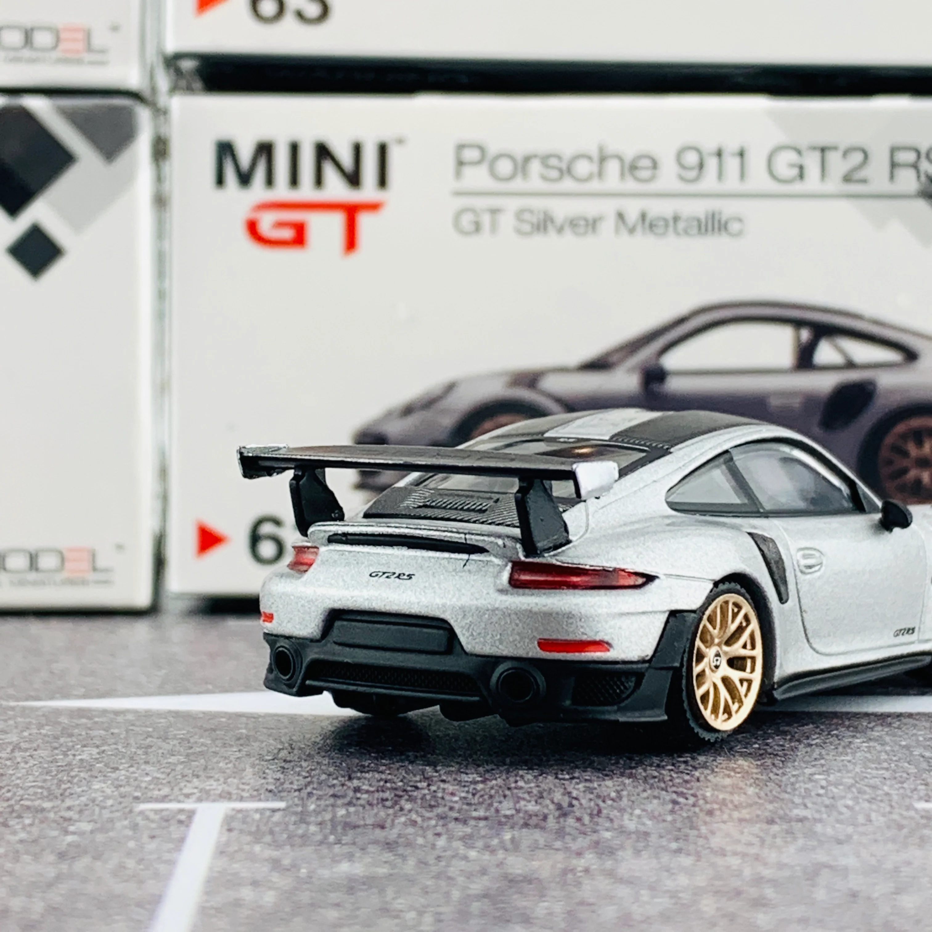 MINI GT 1/64 Porsche 911 Turbo GT2 RS GT Weissach Package Silver Metallic RHD MGT00063-R - Image 5