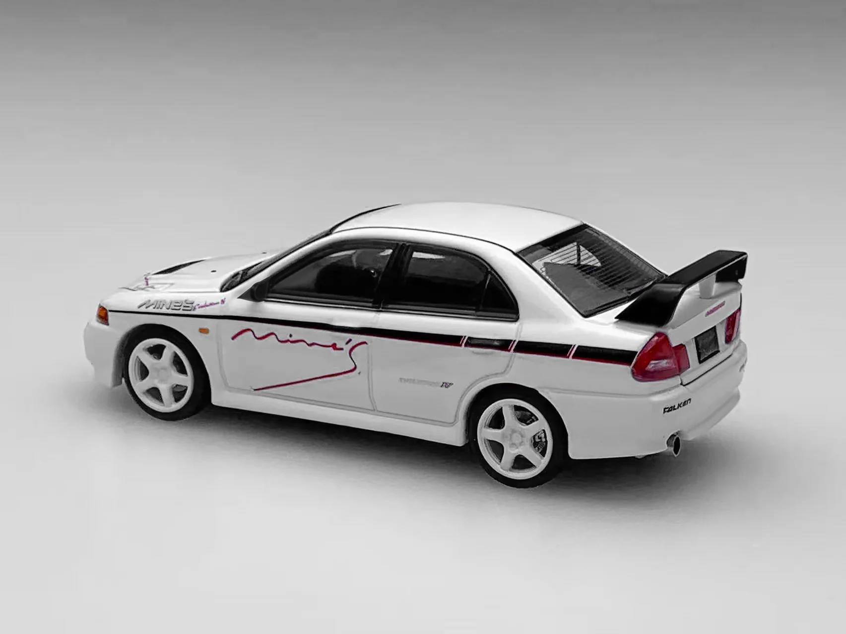 PREORDER Motorhelix 1/64 Mitsubishi Lancer Evolution IV GSR Mine's Livery M64021 (Approx. Release Date: Q1 2026 and subject to the manufacturer's final decision) - Image 2