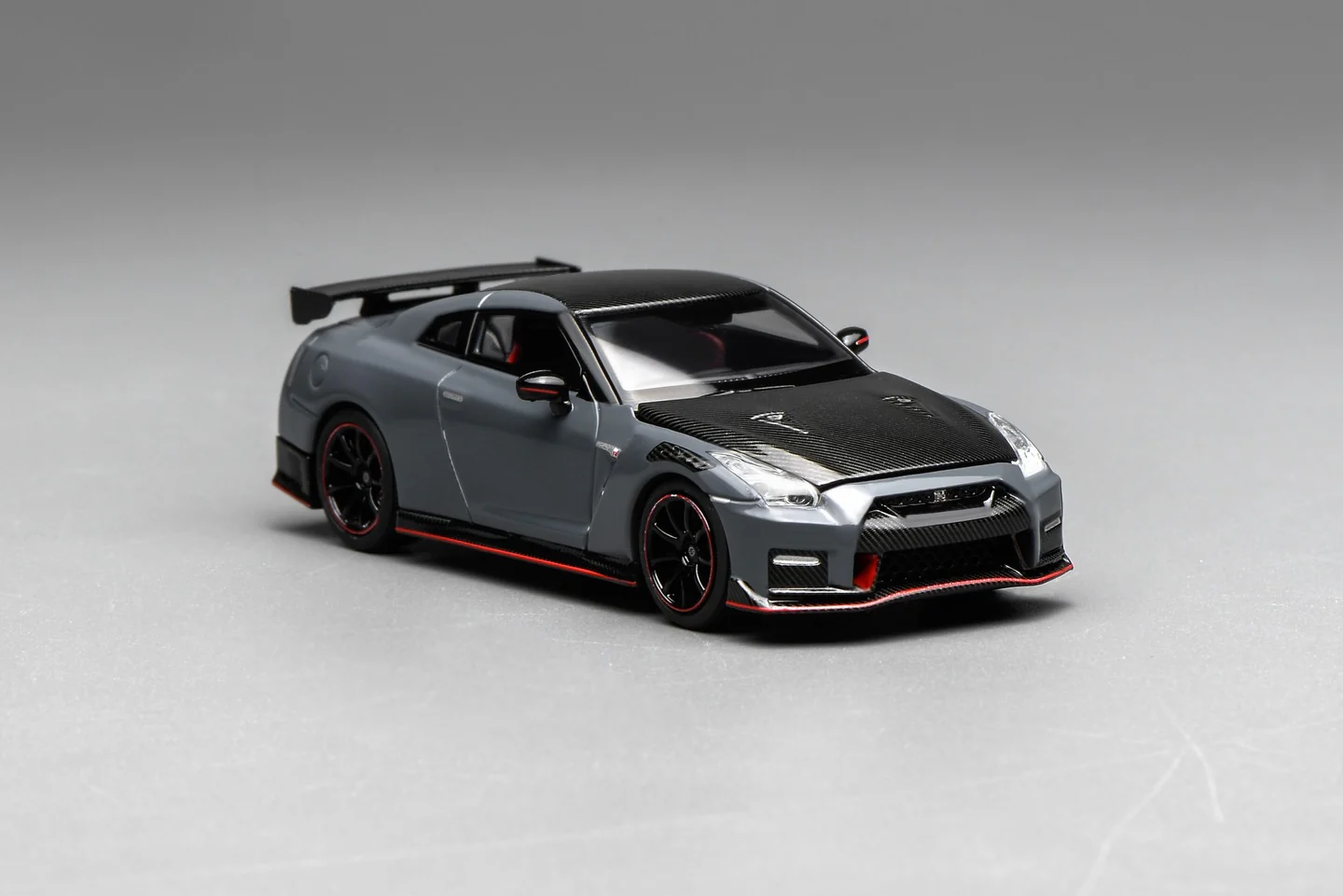 PREORDER Motorhelix 1/64 Nissan GT-R NISMO (R35) Special Edition 2022 NISMO Stealth Gray M63521 (Approx. Release Date: Q1 2026 and subject to the manufacturer's final decision) - Image 2