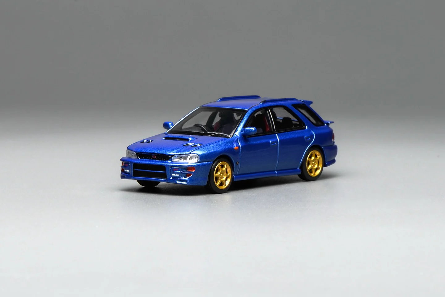 Motorhelix 1/64 Subaru Impreza Wagon WRX STi Version VI (GC8) Customized World Rally Blue Mica M67101 - Image 2