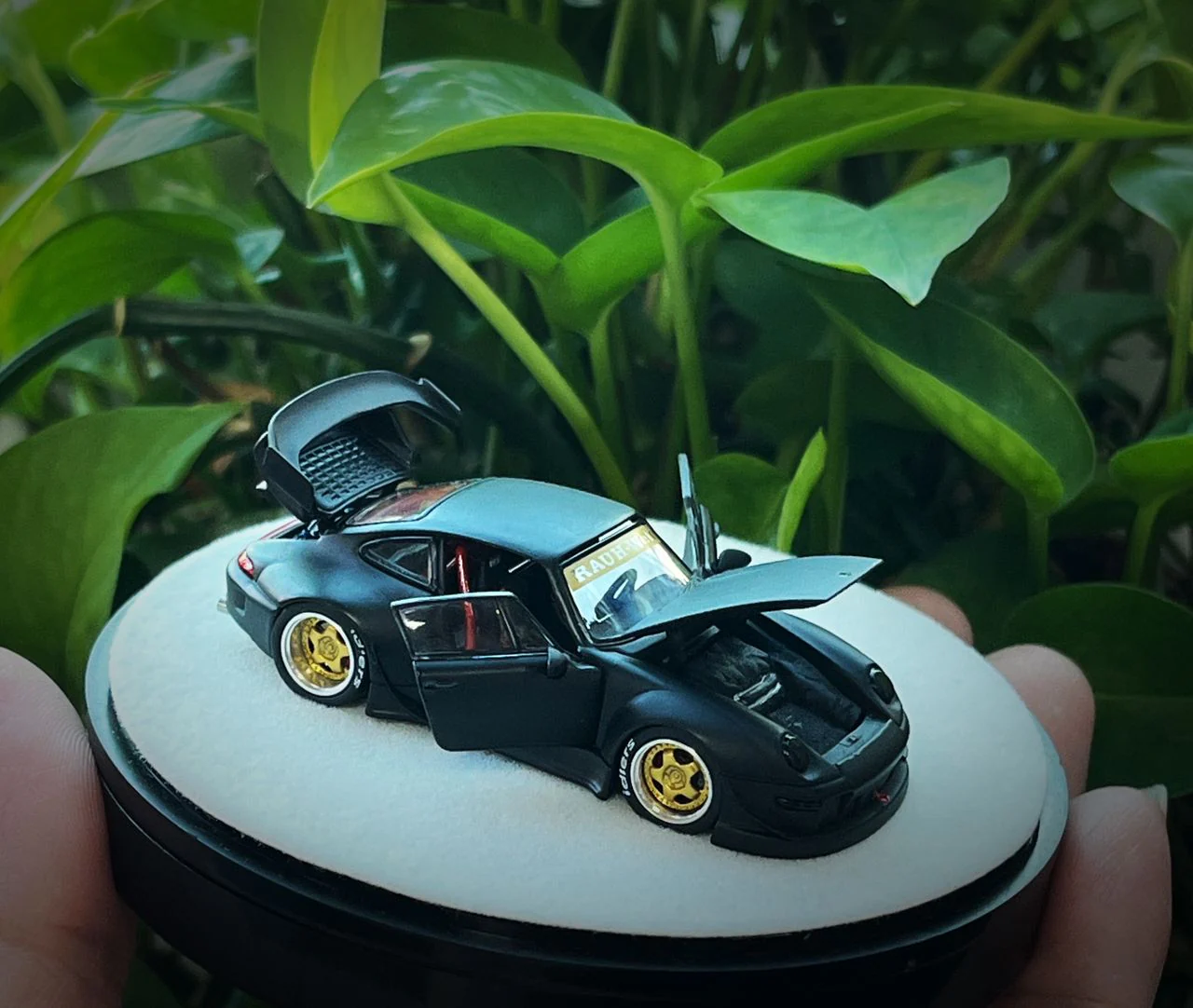 PGM 1/64 RWB 993 Matte Black with Gold Wheel (Delux Round Display Box) - Image 3
