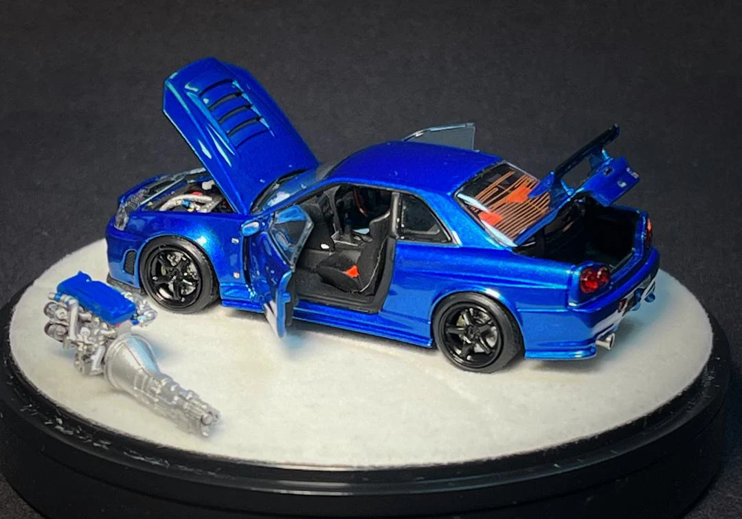 PGM x One Model 1/64 R34 Z Tune Metallic Blue Fully Opened (B) Delux Round Display Box - Image 2