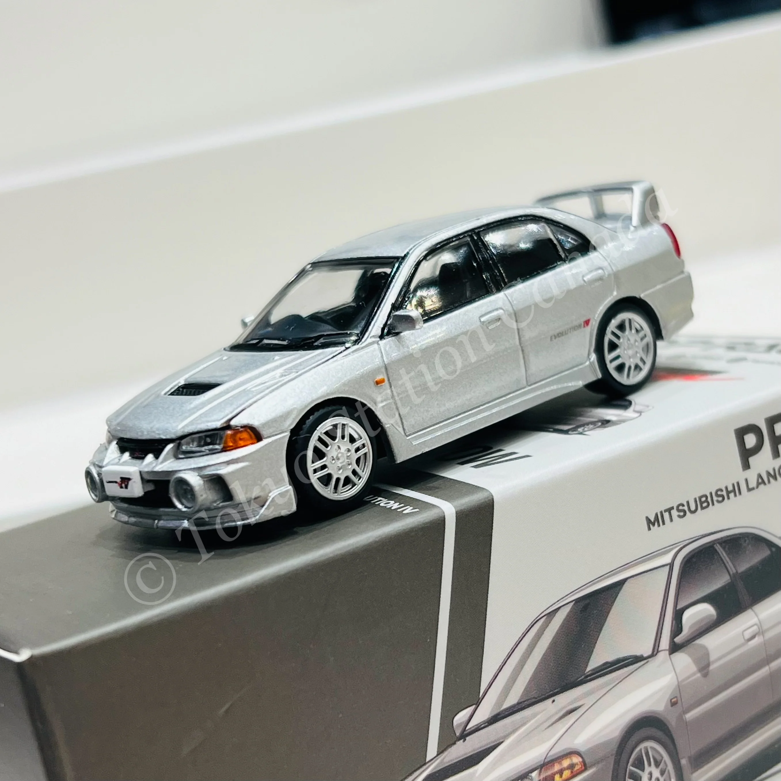 POPRACE 1/64 MITSUBISHI LANCER EVOLUTION IV - STEEL SILVER PR640140 - Image 2