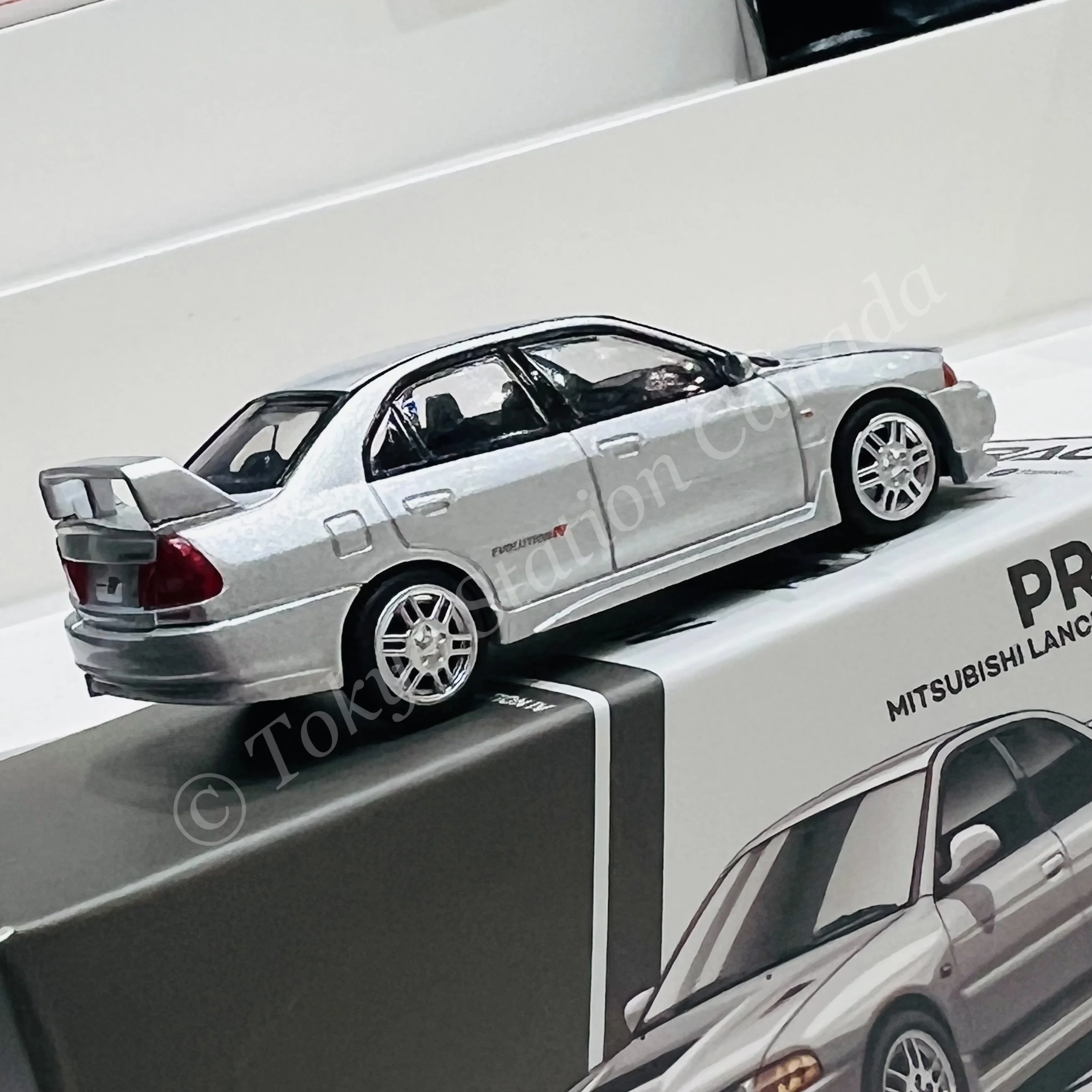 POPRACE 1/64 MITSUBISHI LANCER EVOLUTION IV - STEEL SILVER PR640140 - Image 3